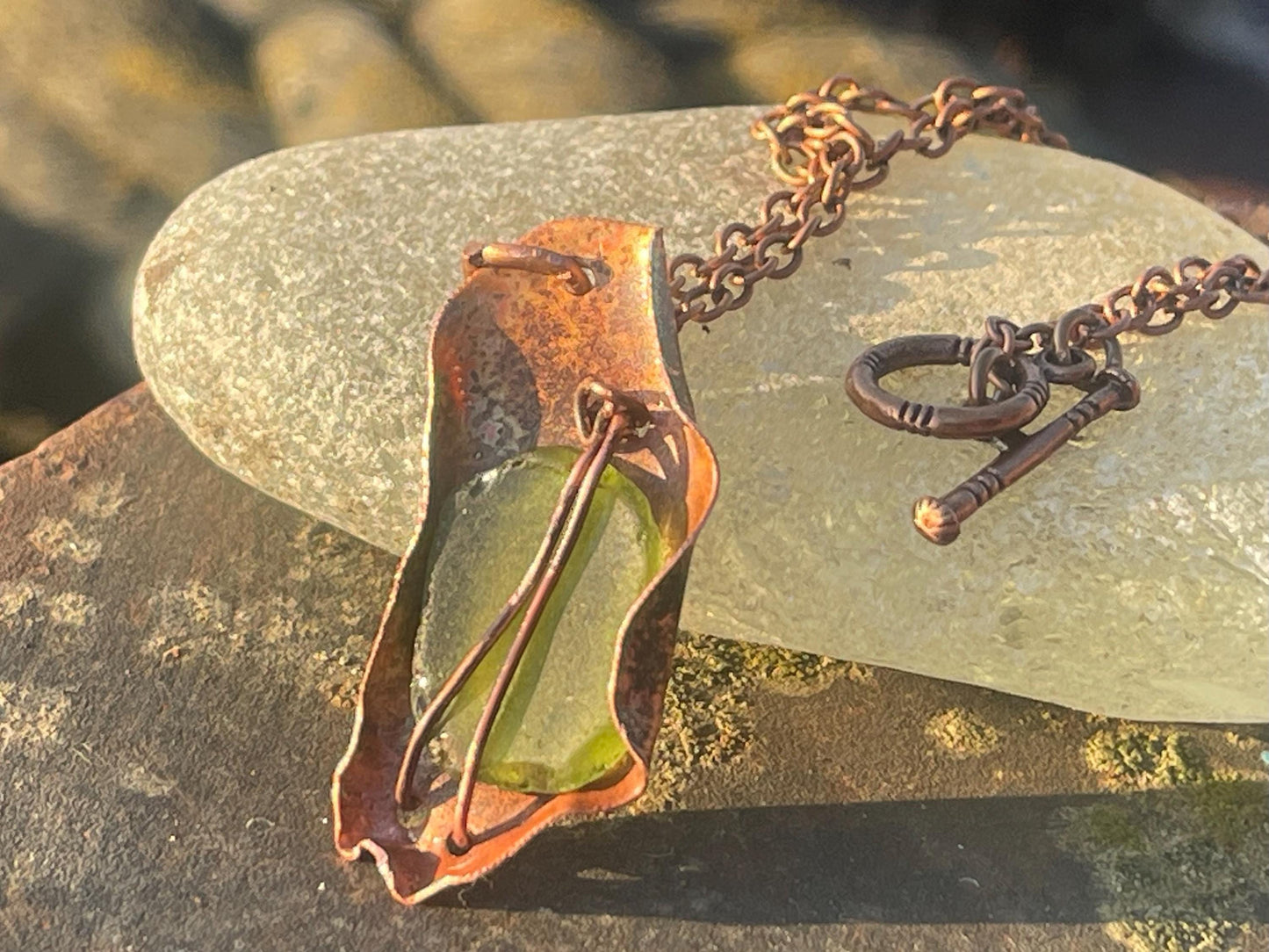 Eco friendly handmade necklace made from sea glass and naturally weathered recycled copper. Ethical jewellery. Unique handmade jewellery.