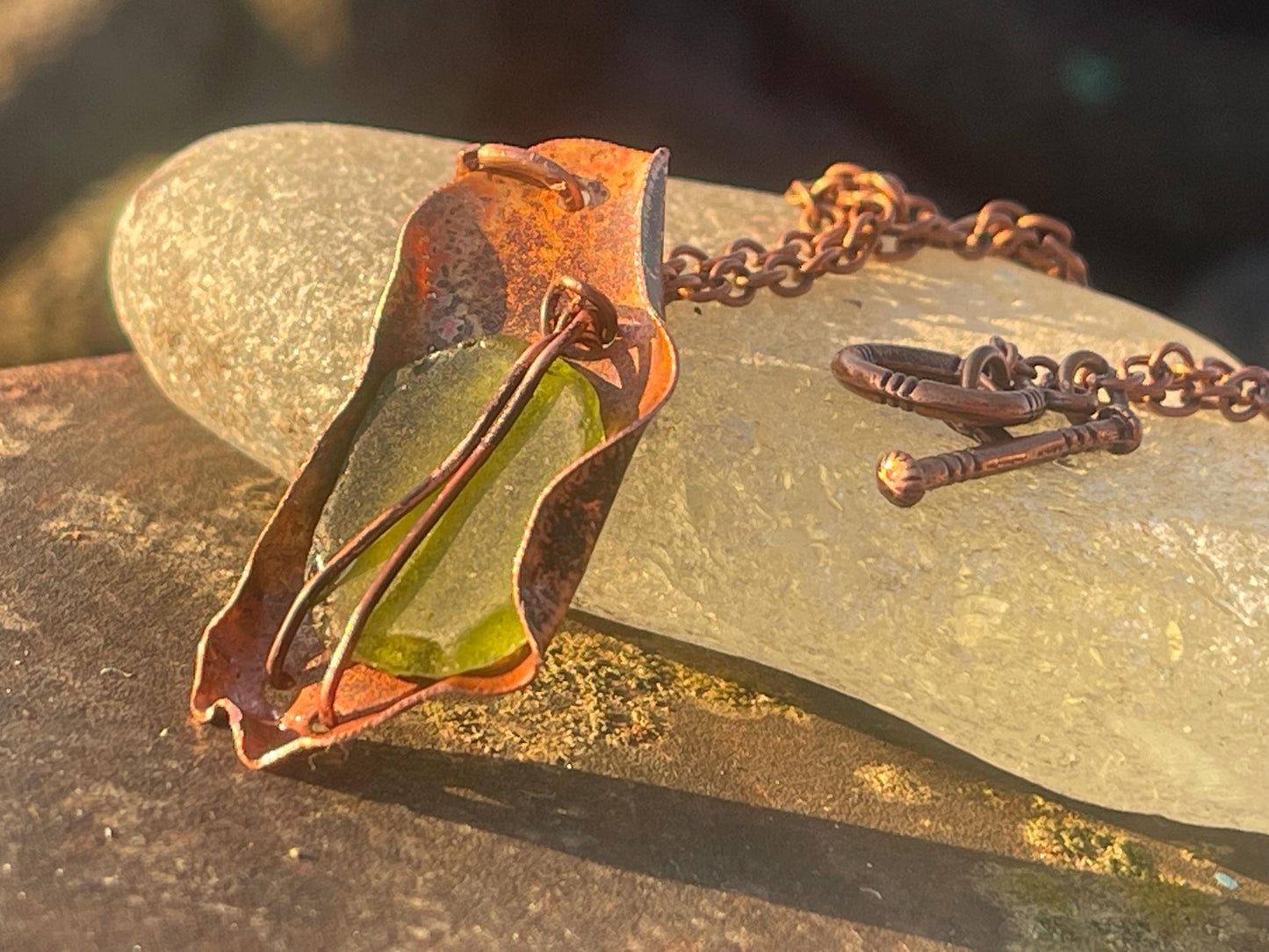 Eco friendly handmade necklace made from sea glass and naturally weathered recycled copper. Ethical jewellery. Unique handmade jewellery.