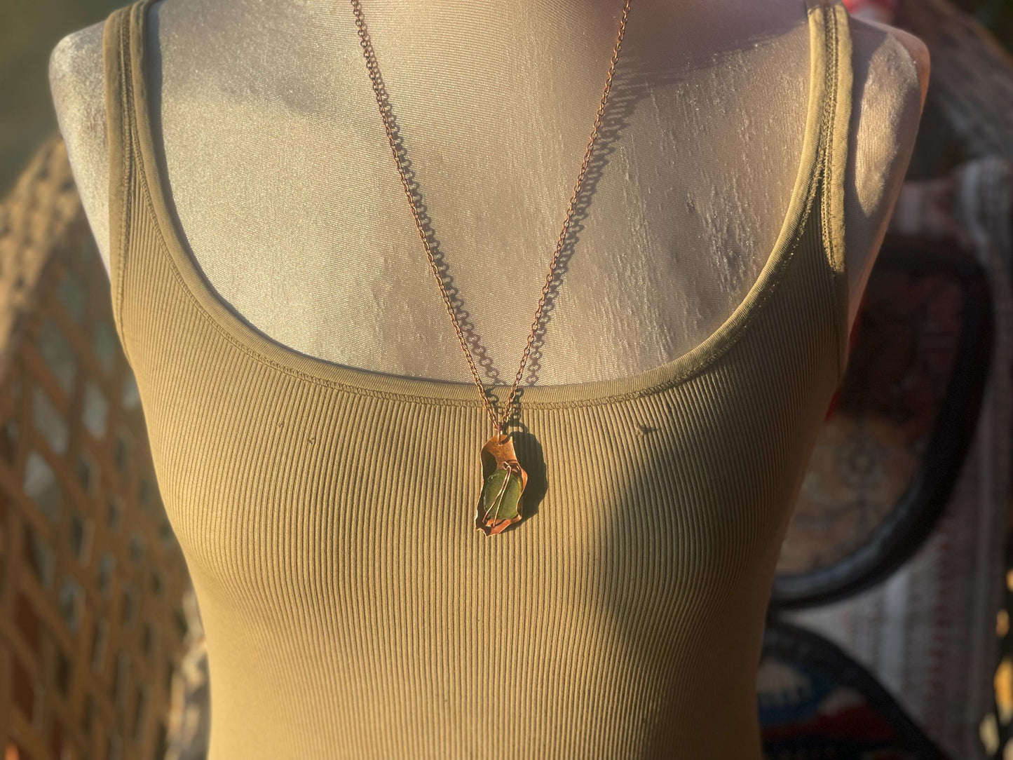 Eco friendly handmade necklace made from sea glass and naturally weathered recycled copper. Ethical jewellery. Unique handmade jewellery.