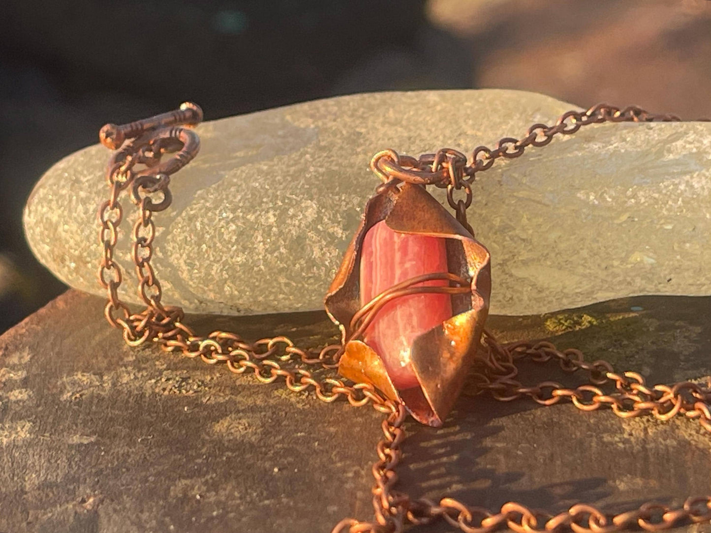 Eco friendly handmade necklace made from Rhodochrosite & naturally weathered recycled copper. Ethical jewellery. Unique handmade jewellery.