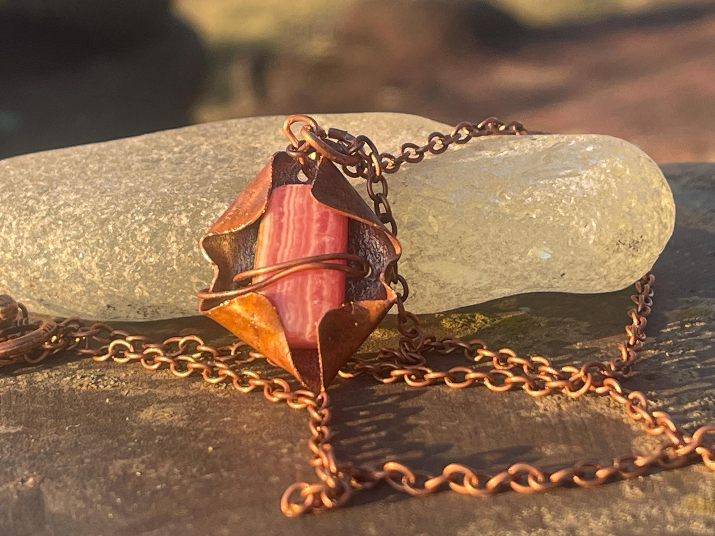 Eco friendly handmade necklace made from Rhodochrosite & naturally weathered recycled copper. Ethical jewellery. Unique handmade jewellery.