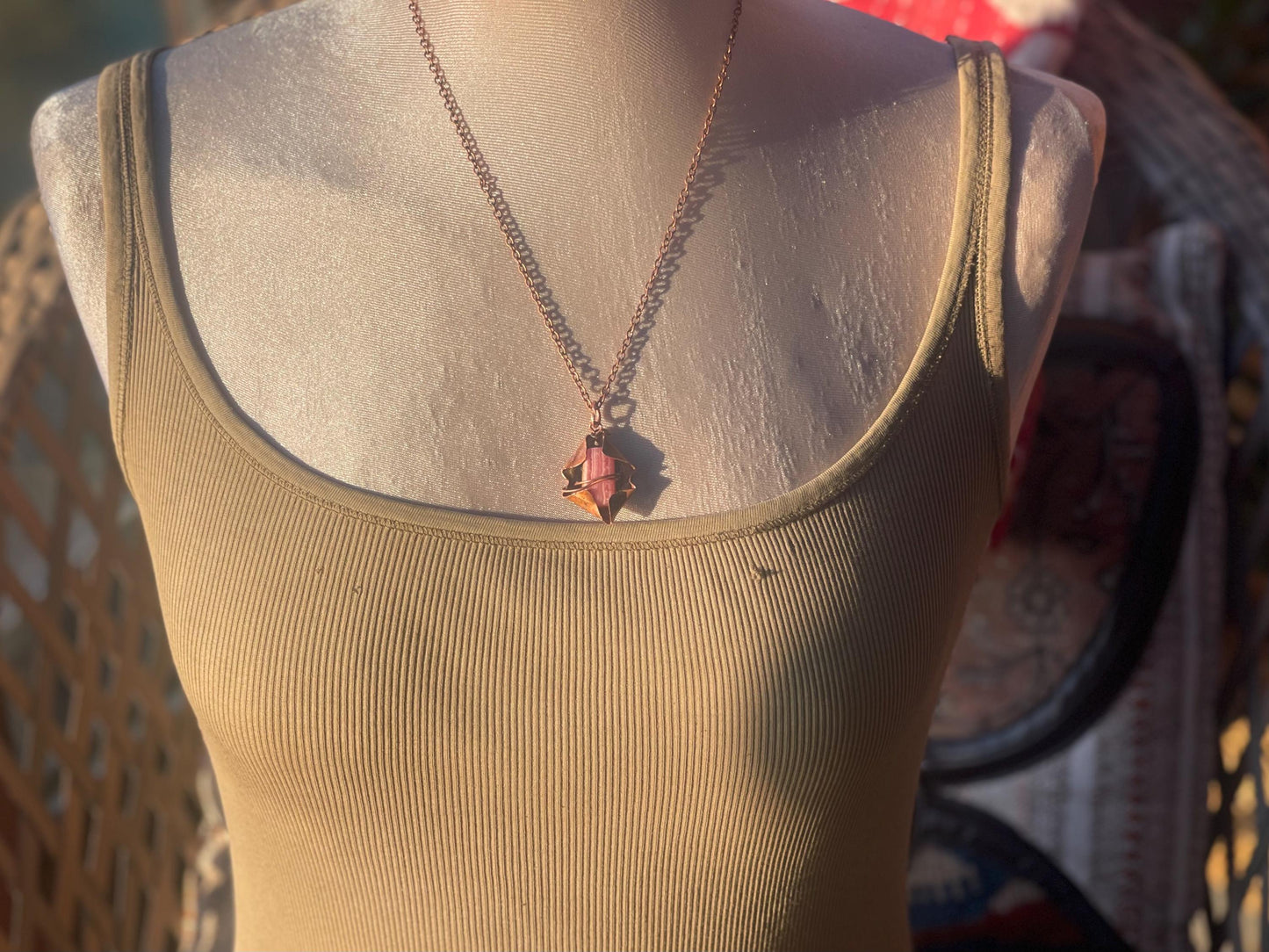 Eco friendly handmade necklace made from Rhodochrosite & naturally weathered recycled copper. Ethical jewellery. Unique handmade jewellery.