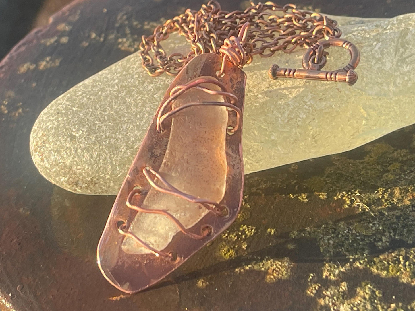 Eco friendly handmade necklace made from sea glass and naturally weathered recycled copper. Ethical jewellery. Unique handmade jewellery.