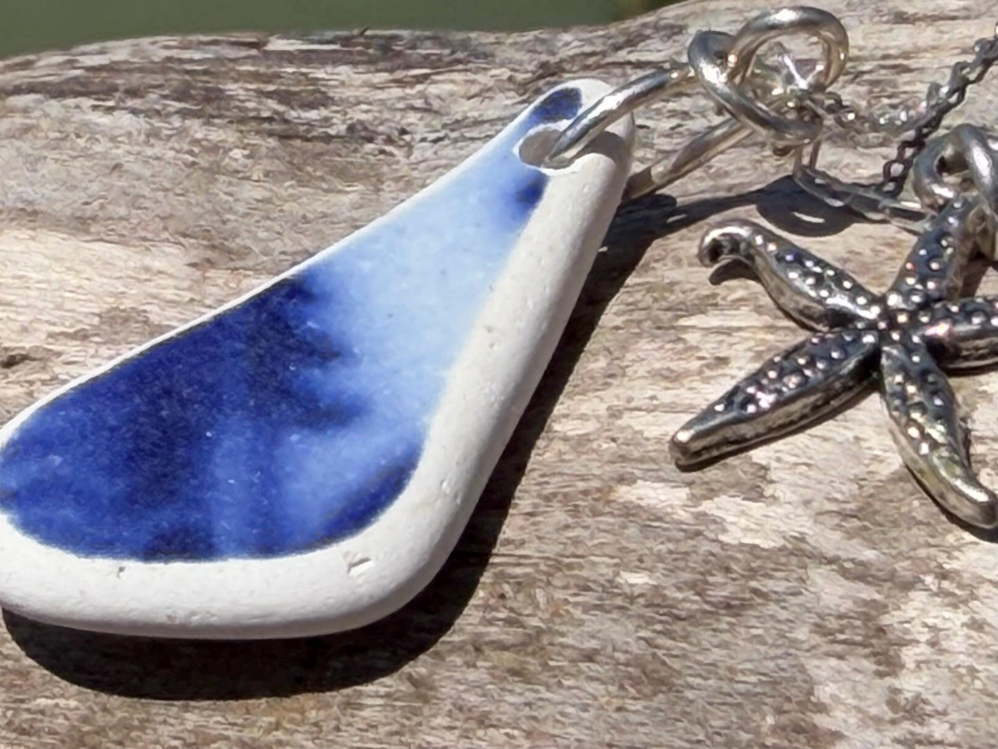 Eco friendly sea ceramic necklace on a sterling silver chain showcasing a little starfish pendant, starfish necklace, ethical jewellery