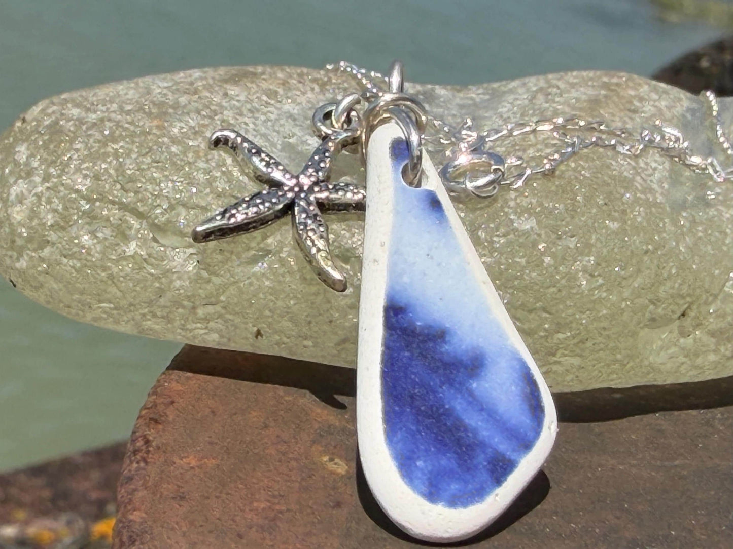 Eco friendly sea ceramic necklace on a sterling silver chain showcasing a little starfish pendant, starfish necklace, ethical jewellery