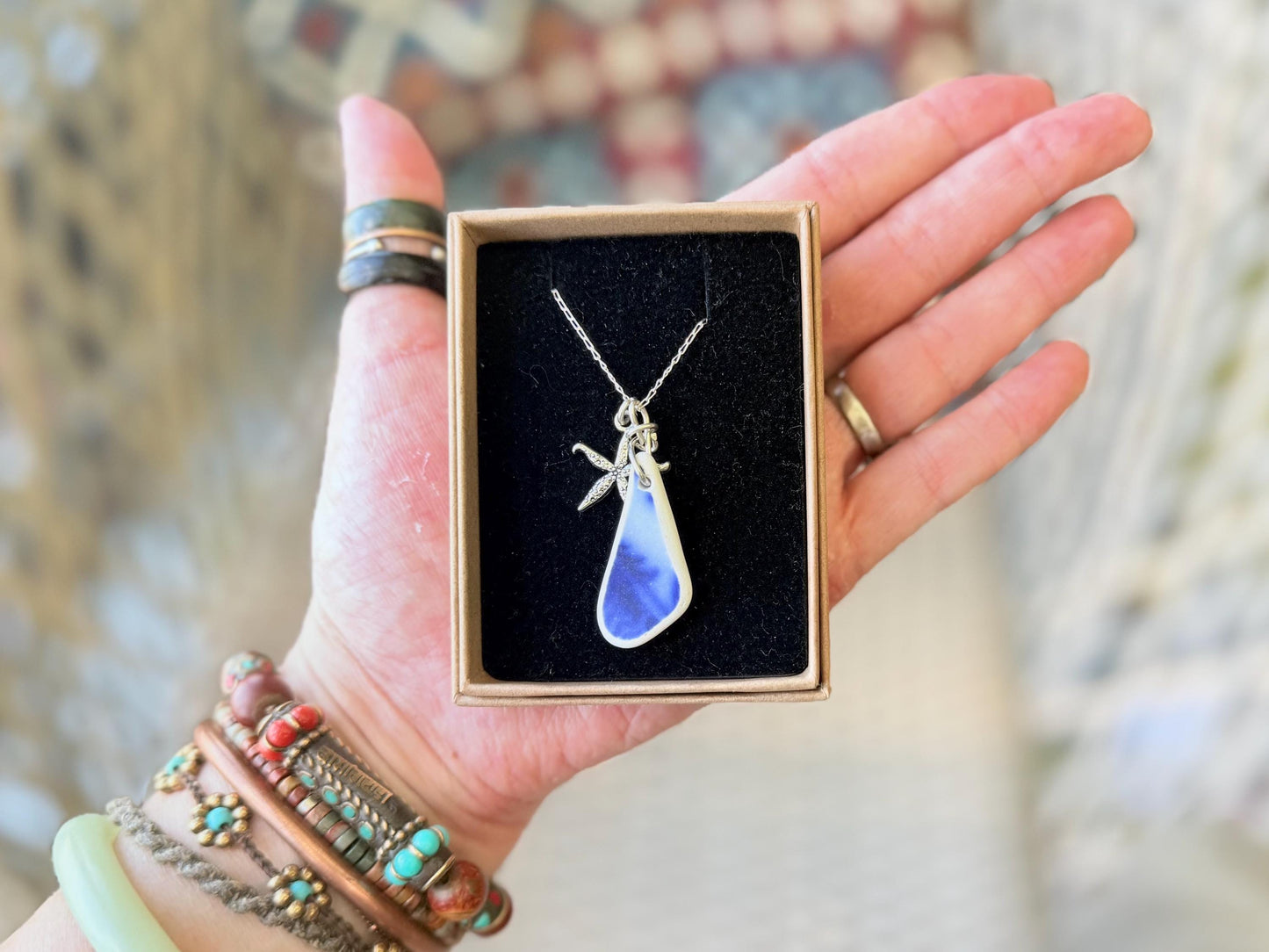 Eco friendly sea ceramic necklace on a sterling silver chain showcasing a little starfish pendant, starfish necklace, ethical jewellery