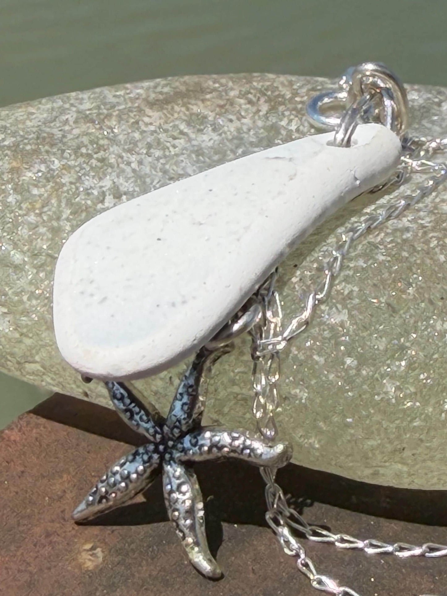 Eco friendly sea ceramic necklace on a sterling silver chain showcasing a little starfish pendant, starfish necklace, ethical jewellery