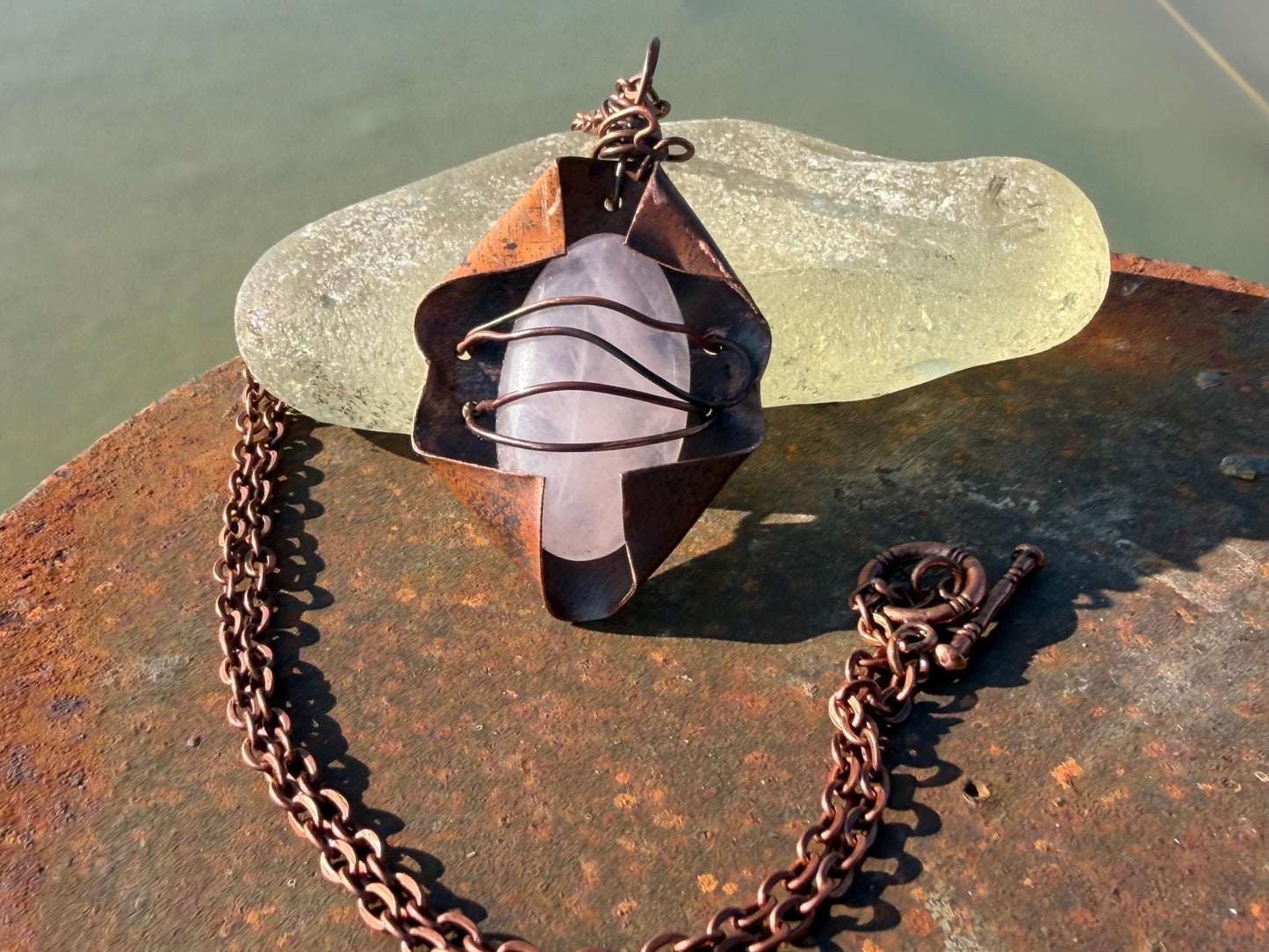 Eco friendly handmade necklace made from rose quartz & naturally weathered recycled copper. Ethical jewellery. Unique handmade jewellery.