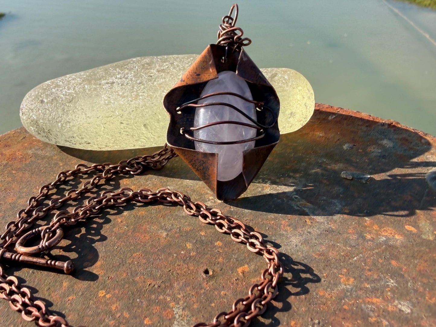 Eco friendly handmade necklace made from rose quartz & naturally weathered recycled copper. Ethical jewellery. Unique handmade jewellery.