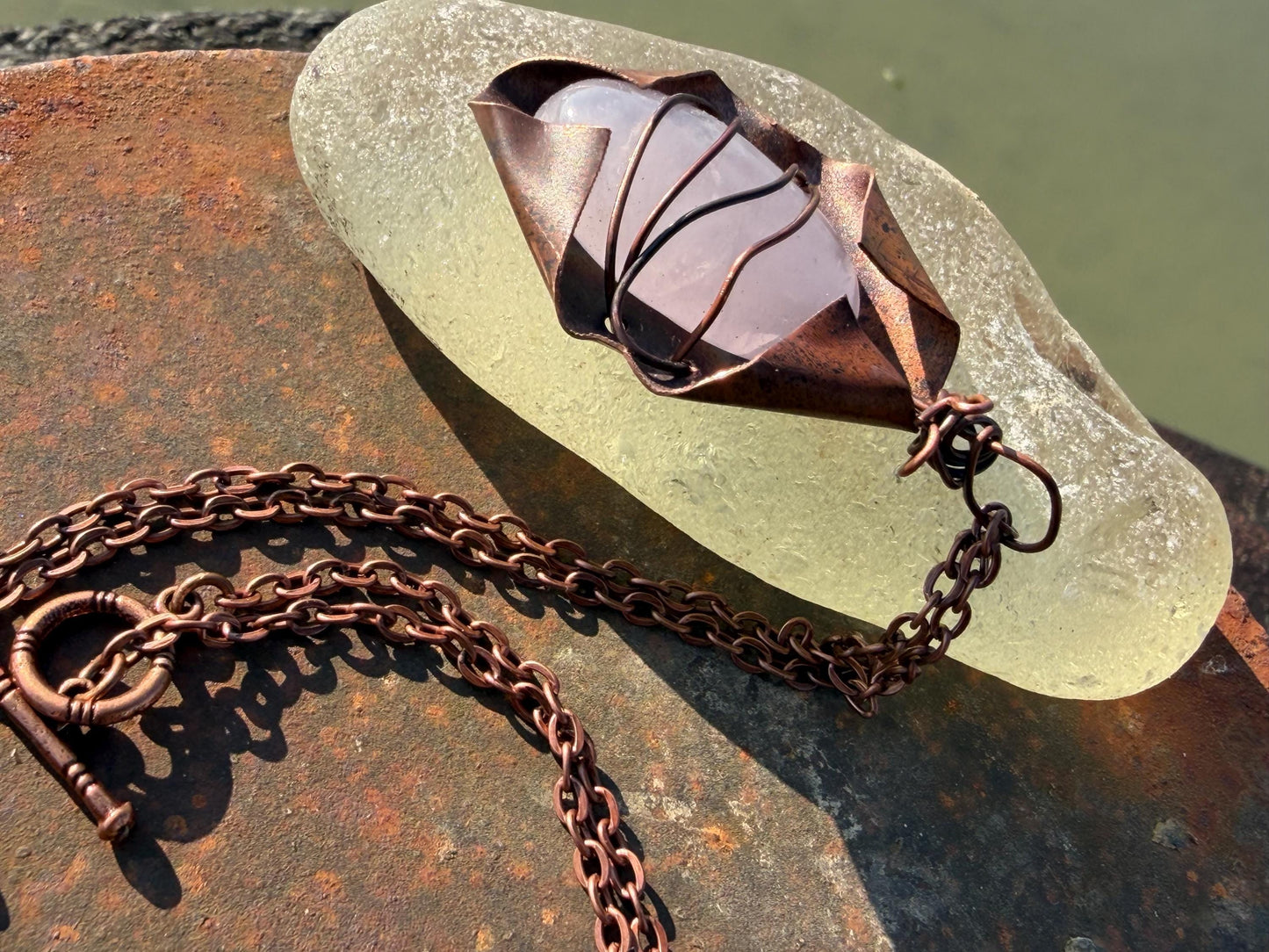 Eco friendly handmade necklace made from rose quartz & naturally weathered recycled copper. Ethical jewellery. Unique handmade jewellery.