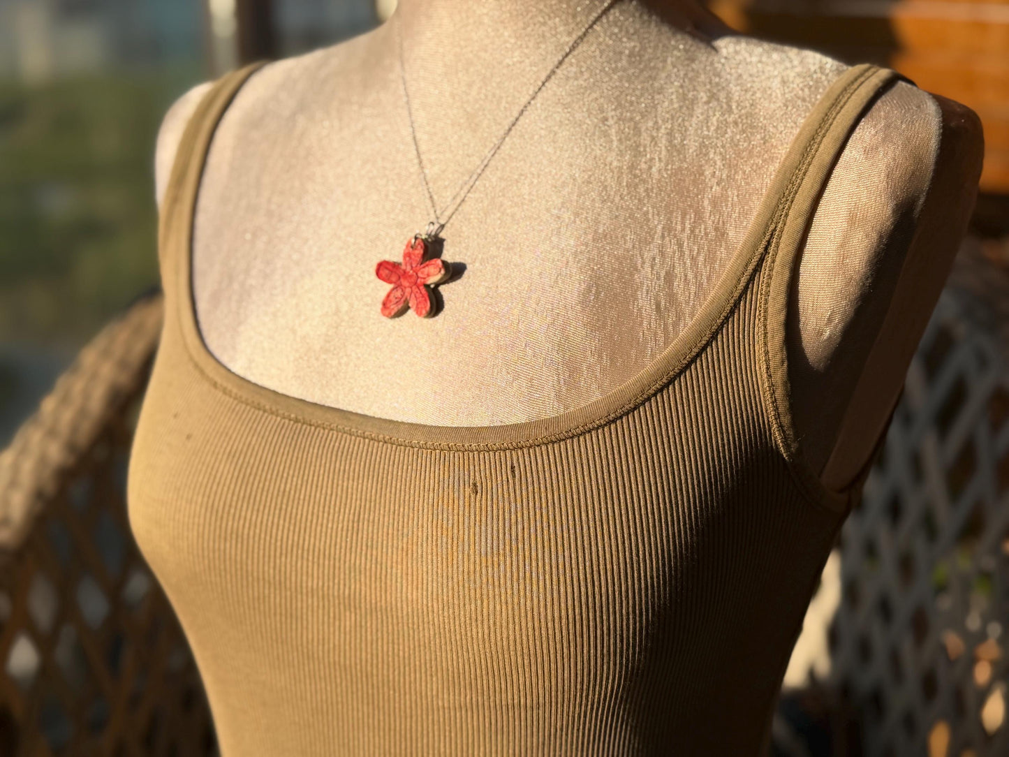 Handmade ceramic flower necklace on a recycled sterling silver chain. Eco friendly jewellery, ethical jewellery, eco necklaces.