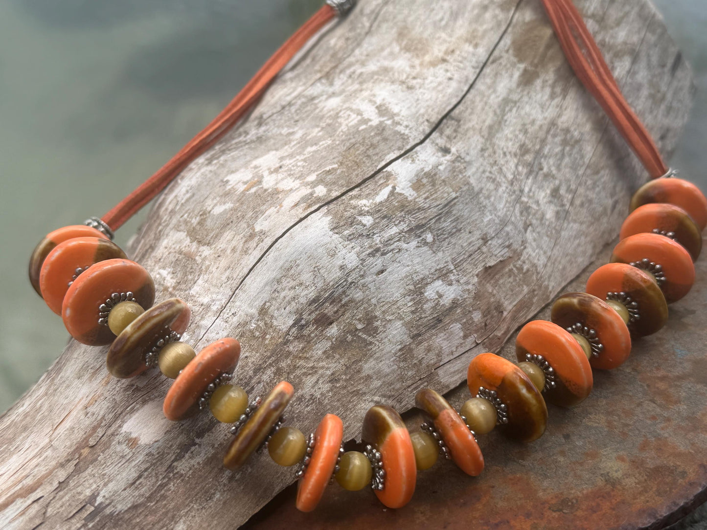 Joyful orange statement necklace. Vintage jewellery, ethical jewellery, orange pendant, boho unique necklace. Eco friendly jewellery.