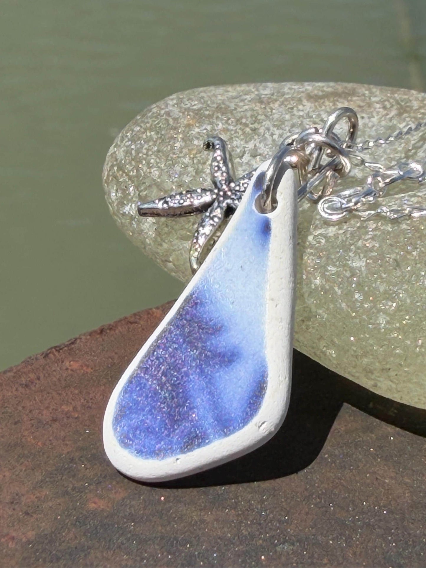 Eco friendly sea ceramic necklace on a sterling silver chain showcasing a little starfish pendant, starfish necklace, ethical jewellery