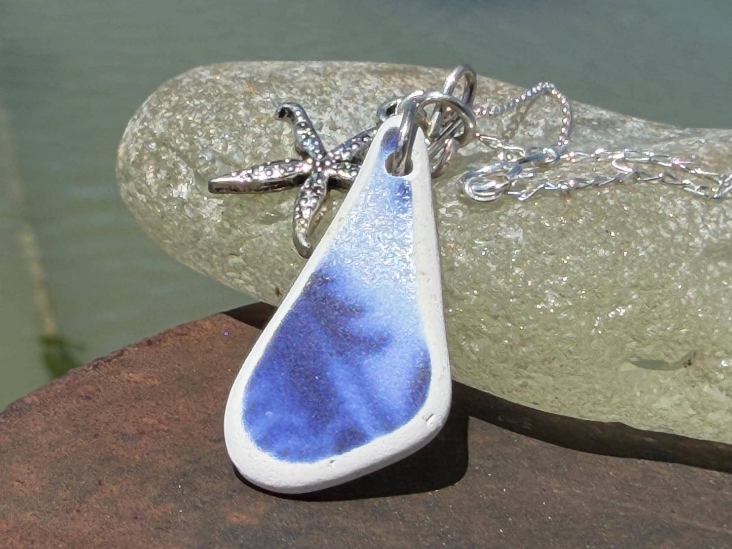 Eco friendly sea ceramic necklace on a sterling silver chain showcasing a little starfish pendant, starfish necklace, ethical jewellery