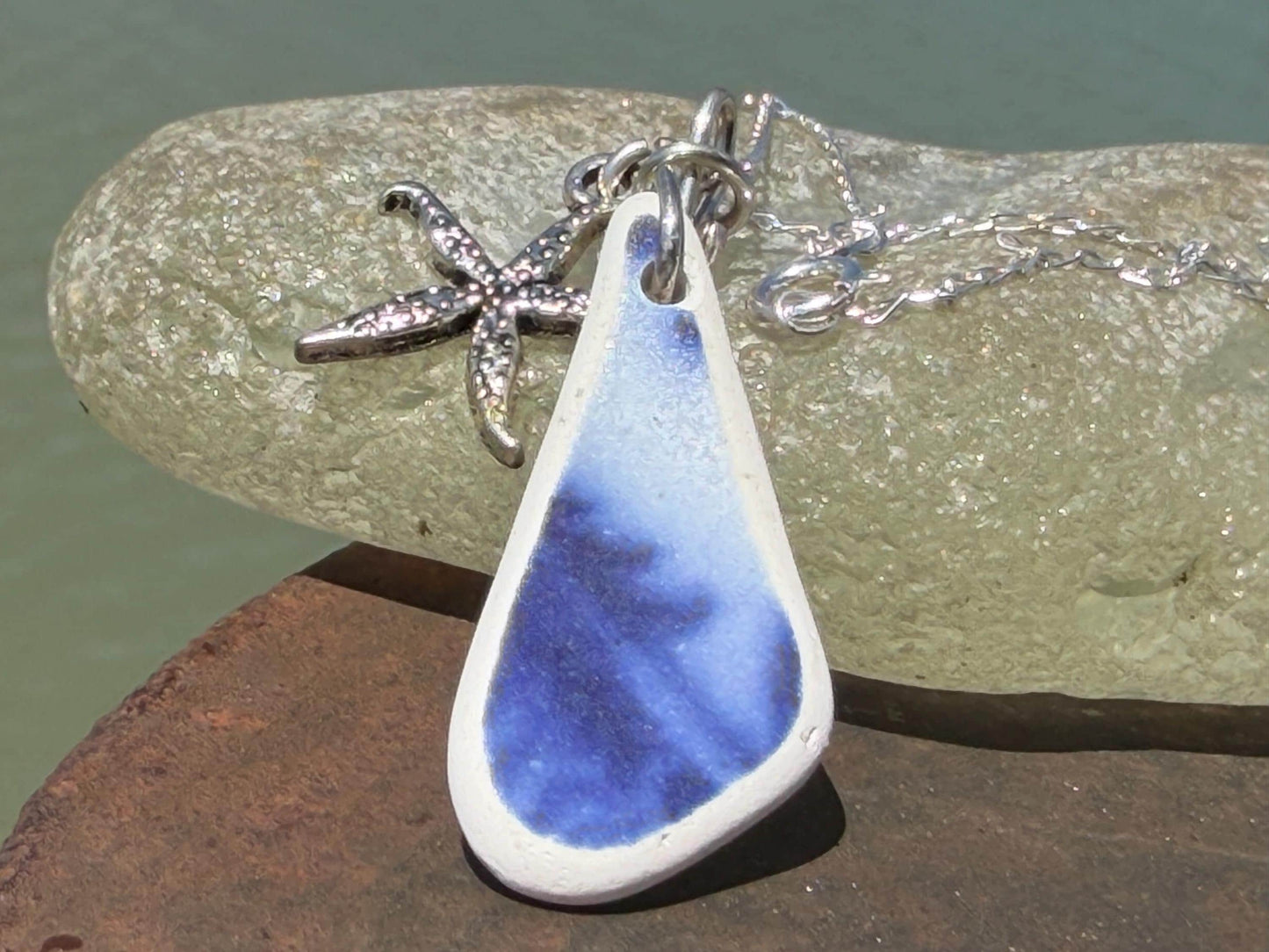 Eco friendly sea ceramic necklace on a sterling silver chain showcasing a little starfish pendant, starfish necklace, ethical jewellery