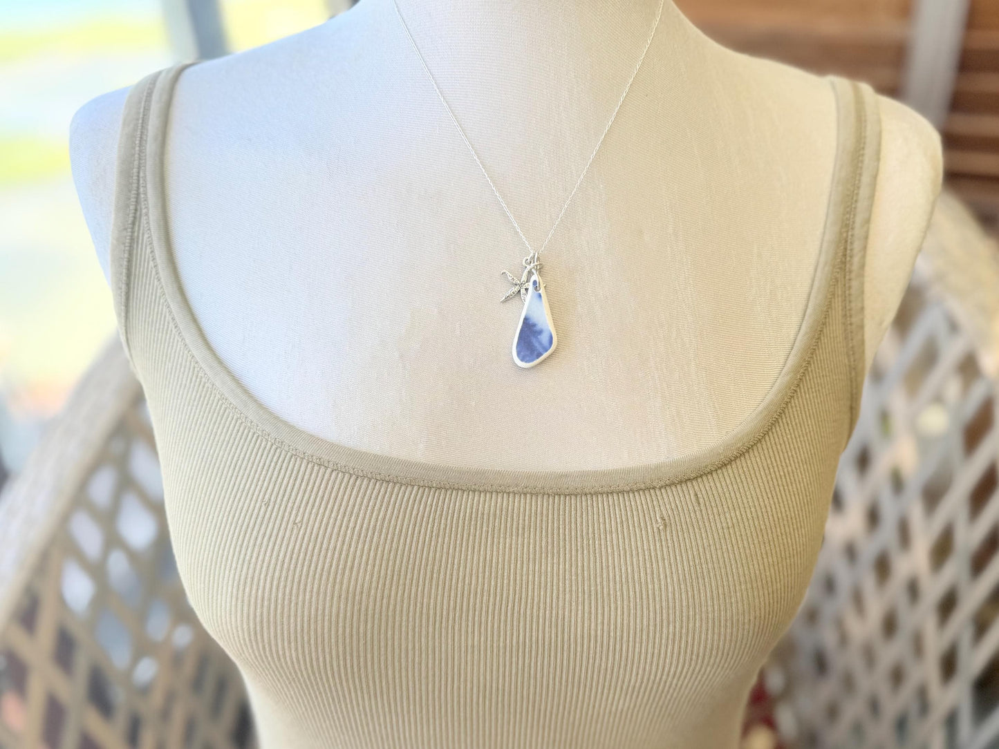 Eco friendly sea ceramic necklace on a sterling silver chain showcasing a little starfish pendant, starfish necklace, ethical jewellery