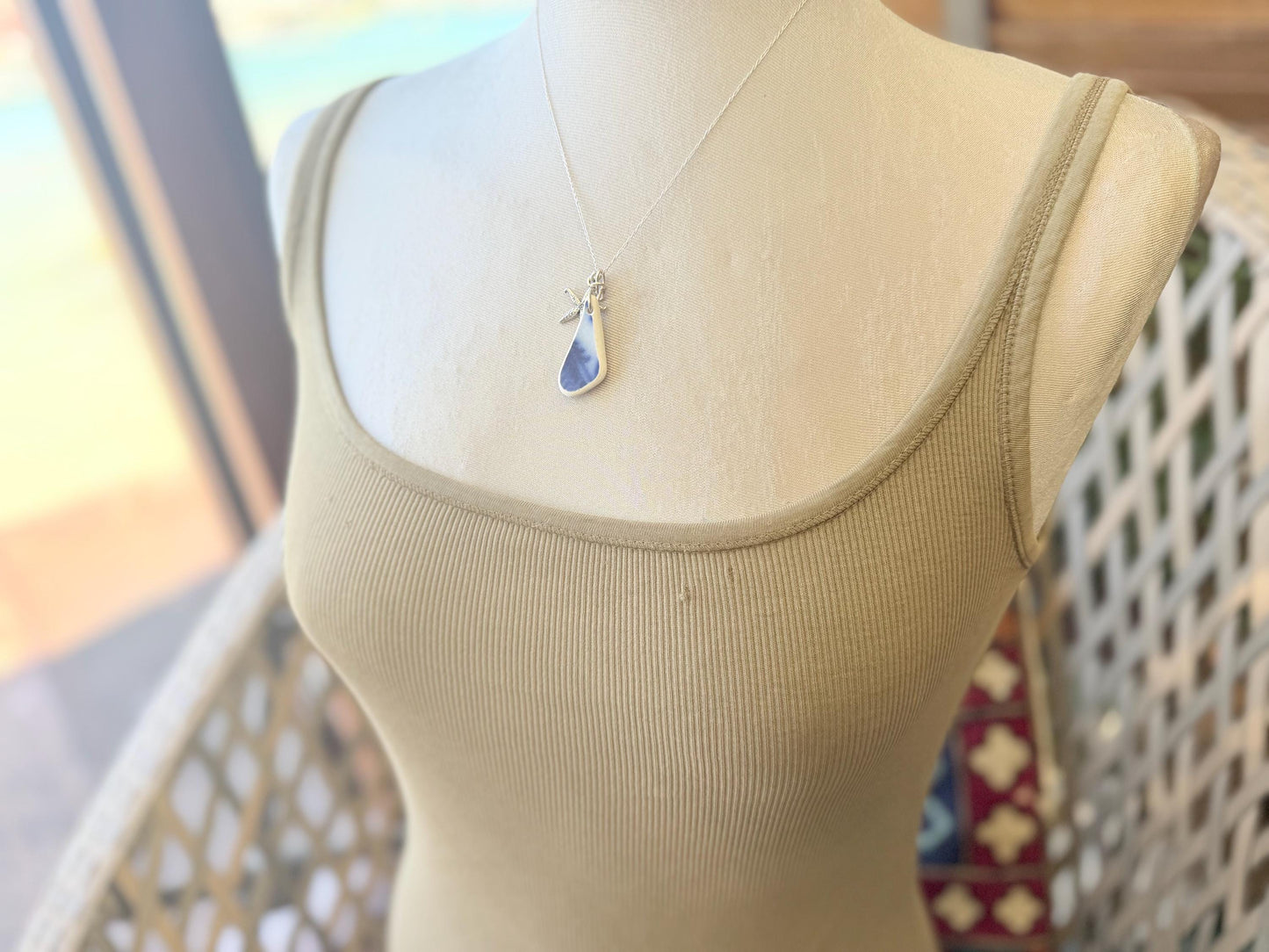 Eco friendly sea ceramic necklace on a sterling silver chain showcasing a little starfish pendant, starfish necklace, ethical jewellery
