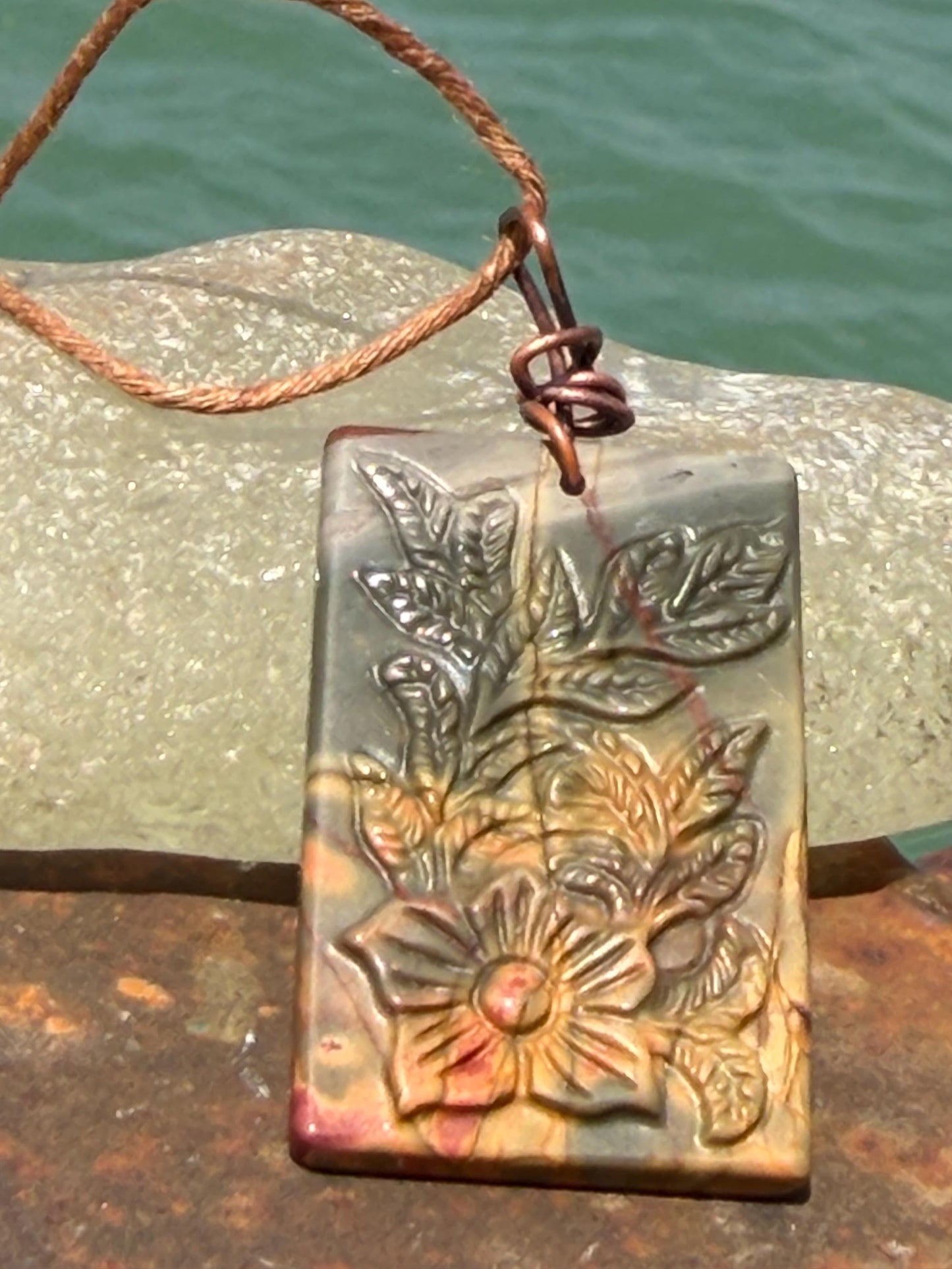 Carved Picasso Jasper gemstone necklace. Unusual gemstone jewellery. Boho eco friendly necklace with carved flowers and leaves.