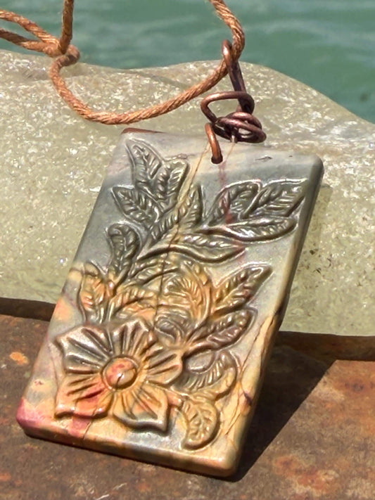 Carved Picasso Jasper gemstone necklace. Unusual gemstone jewellery. Boho eco friendly necklace with carved flowers and leaves.