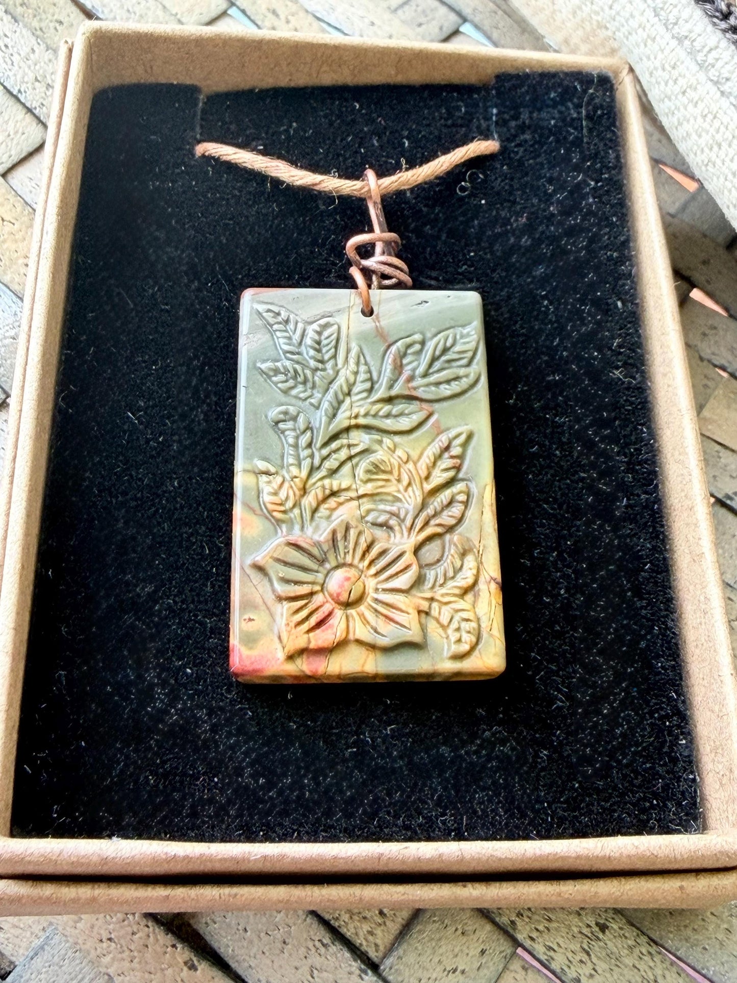 Carved Picasso Jasper gemstone necklace. Unusual gemstone jewellery. Boho eco friendly necklace with carved flowers and leaves.