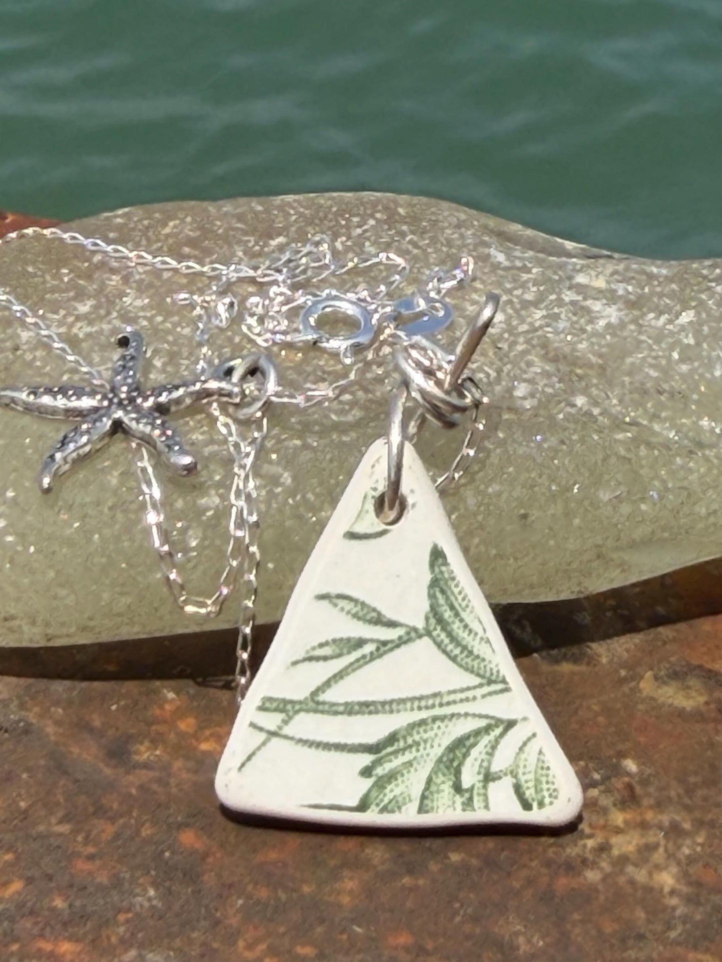 Eco friendly sea ceramic necklace on a sterling silver chain. Eco friendly jewellery, ethical jewellery. Eco friendly necklace.