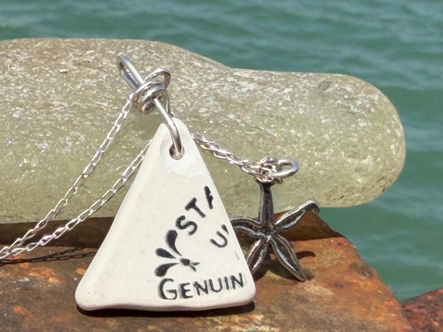 Eco friendly sea ceramic necklace on a sterling silver chain. Eco friendly jewellery, ethical jewellery. Eco friendly necklace.