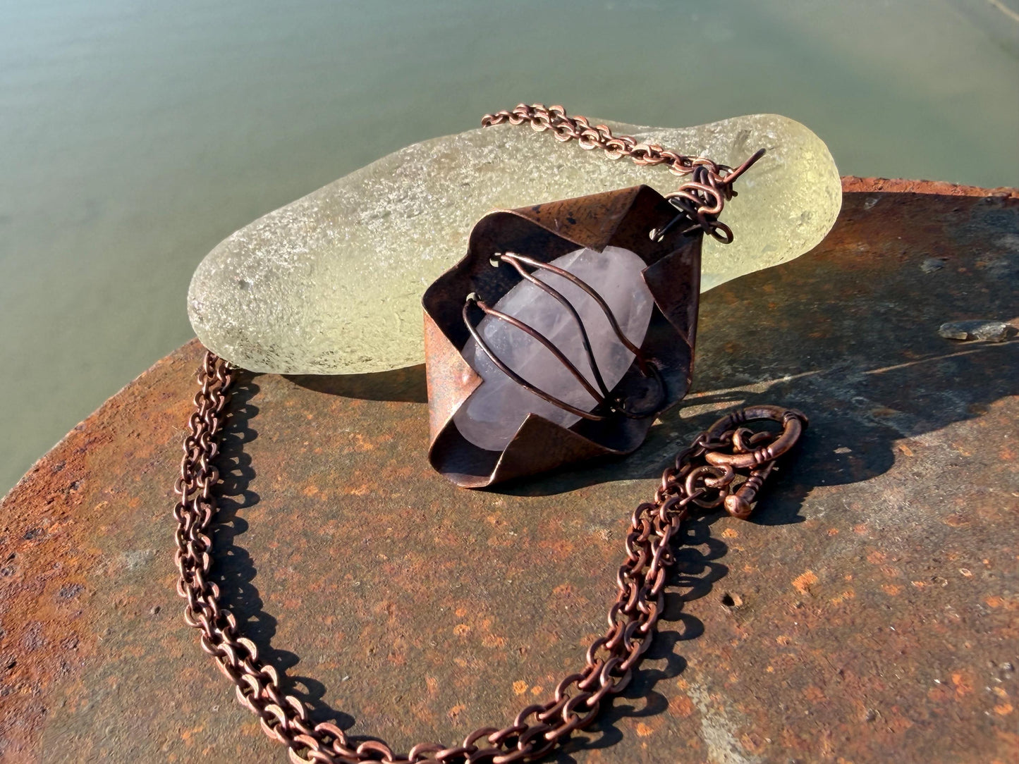 Eco friendly handmade necklace made from rose quartz & naturally weathered recycled copper. Ethical jewellery. Unique handmade jewellery.