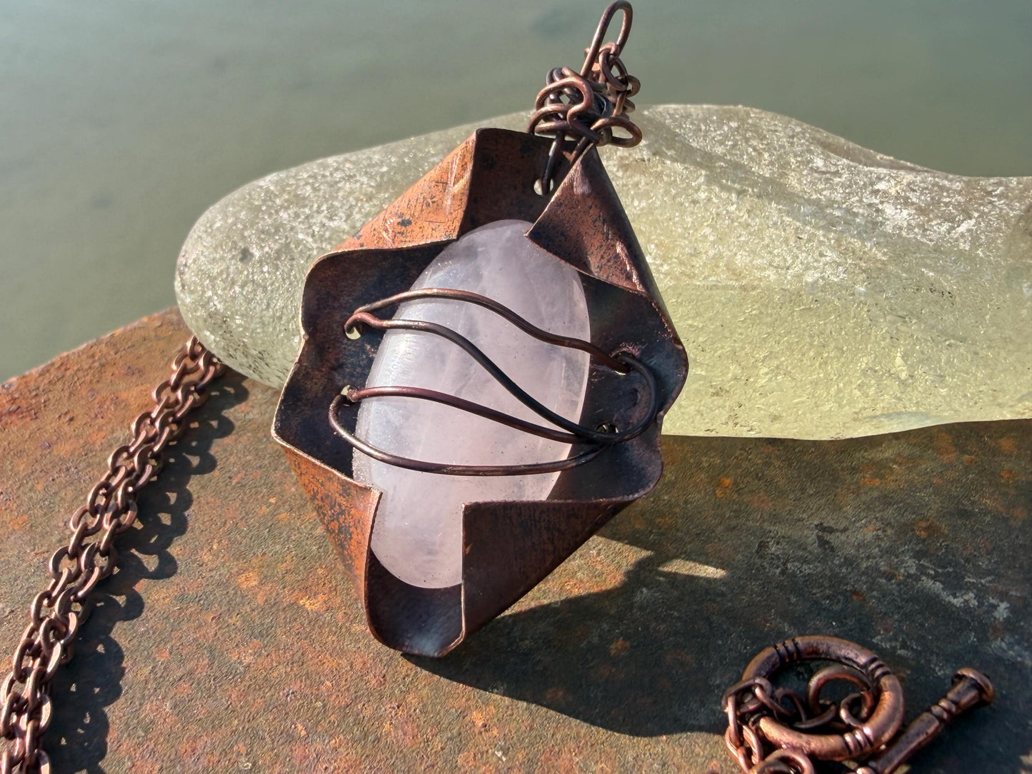 Eco friendly handmade necklace made from rose quartz & naturally weathered recycled copper. Ethical jewellery. Unique handmade jewellery.