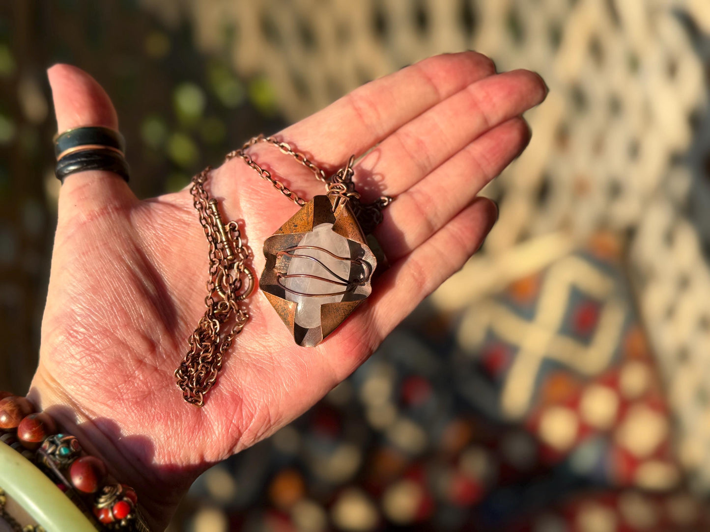 Eco friendly handmade necklace made from rose quartz & naturally weathered recycled copper. Ethical jewellery. Unique handmade jewellery.