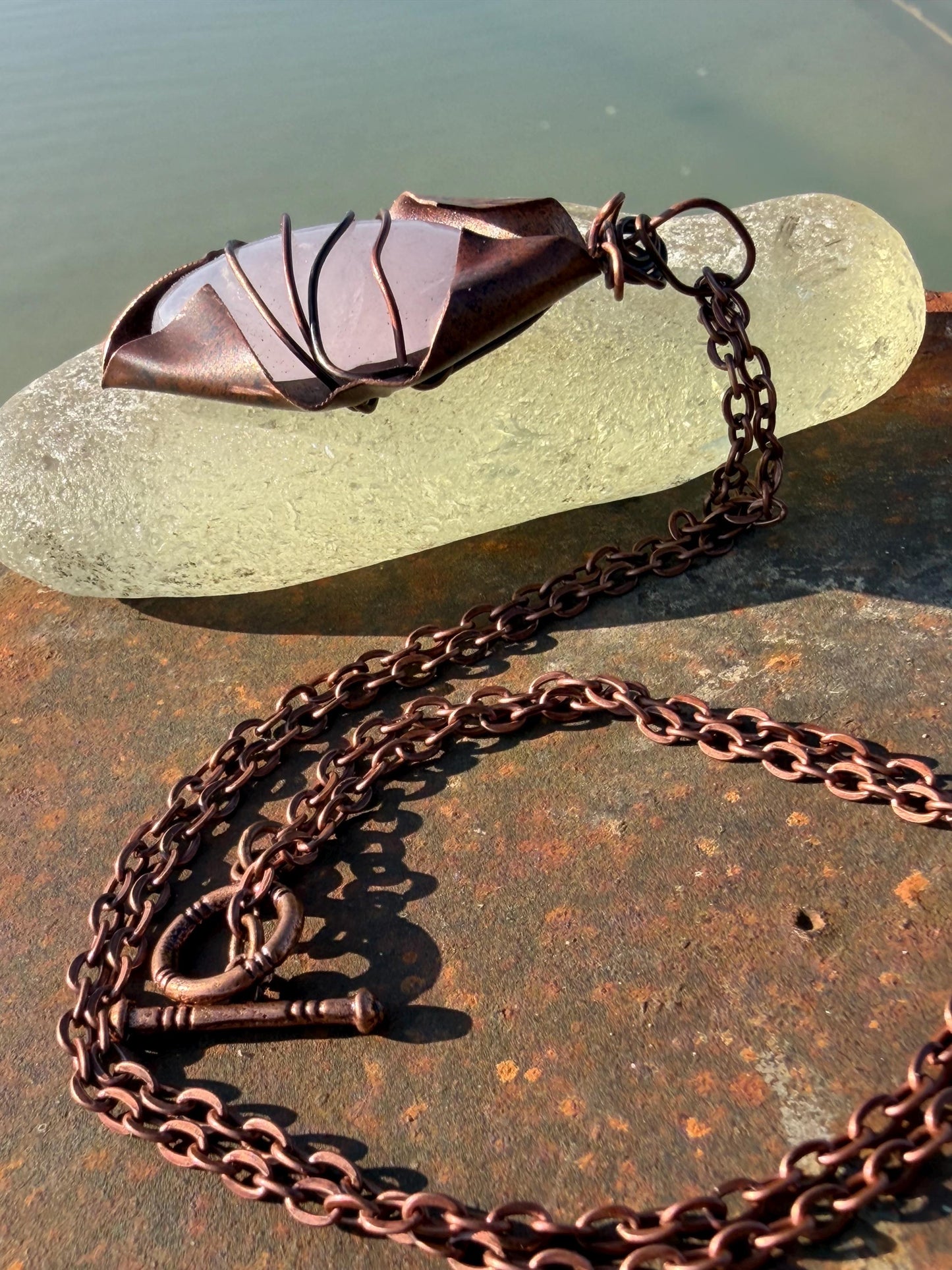 Eco friendly handmade necklace made from rose quartz & naturally weathered recycled copper. Ethical jewellery. Unique handmade jewellery.