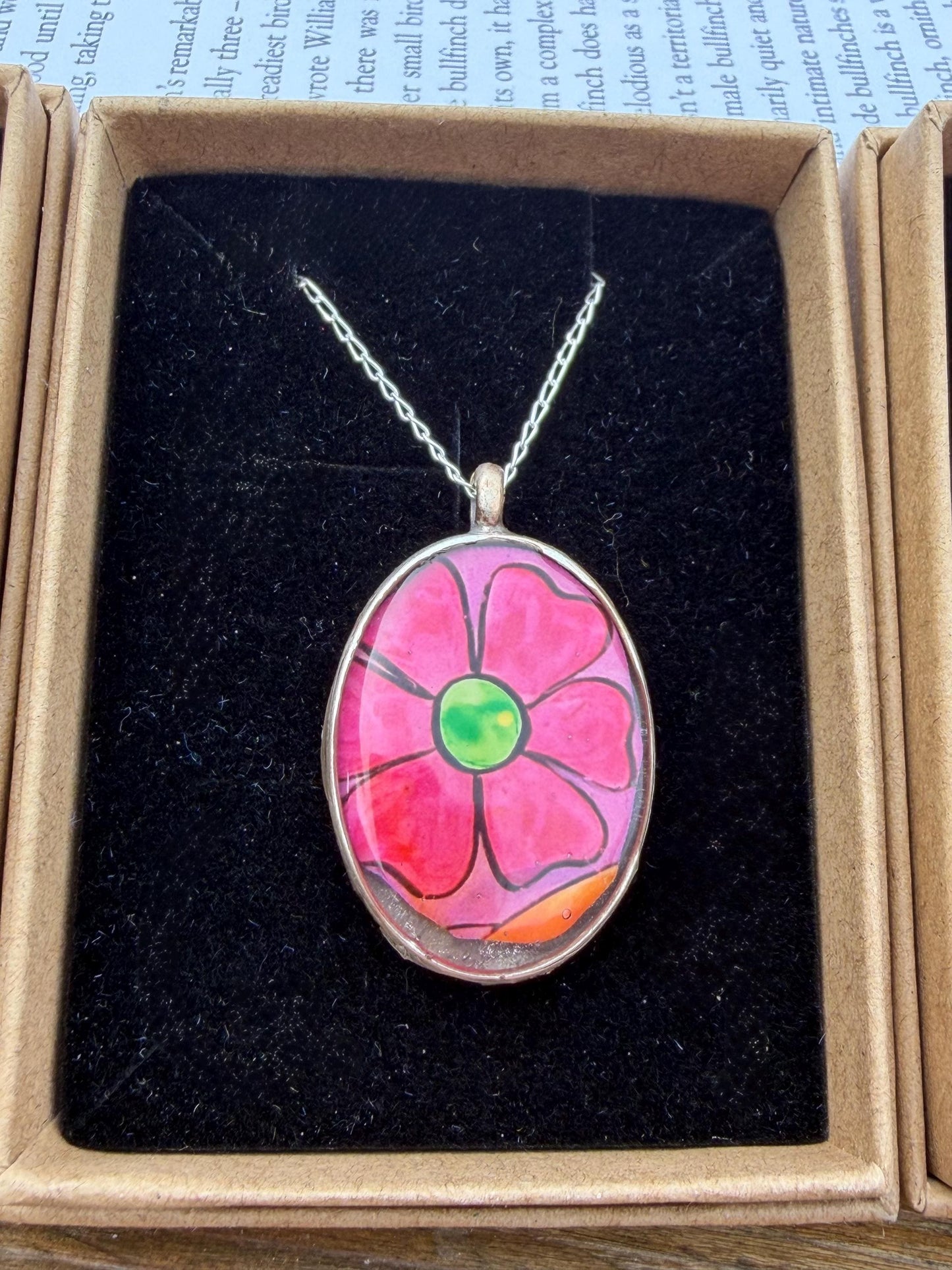 Bright joyful necklaces made with my own photos & recycled sterling silver. Eco friendly jewellery. Boho colourful pendants. Bright pink.
