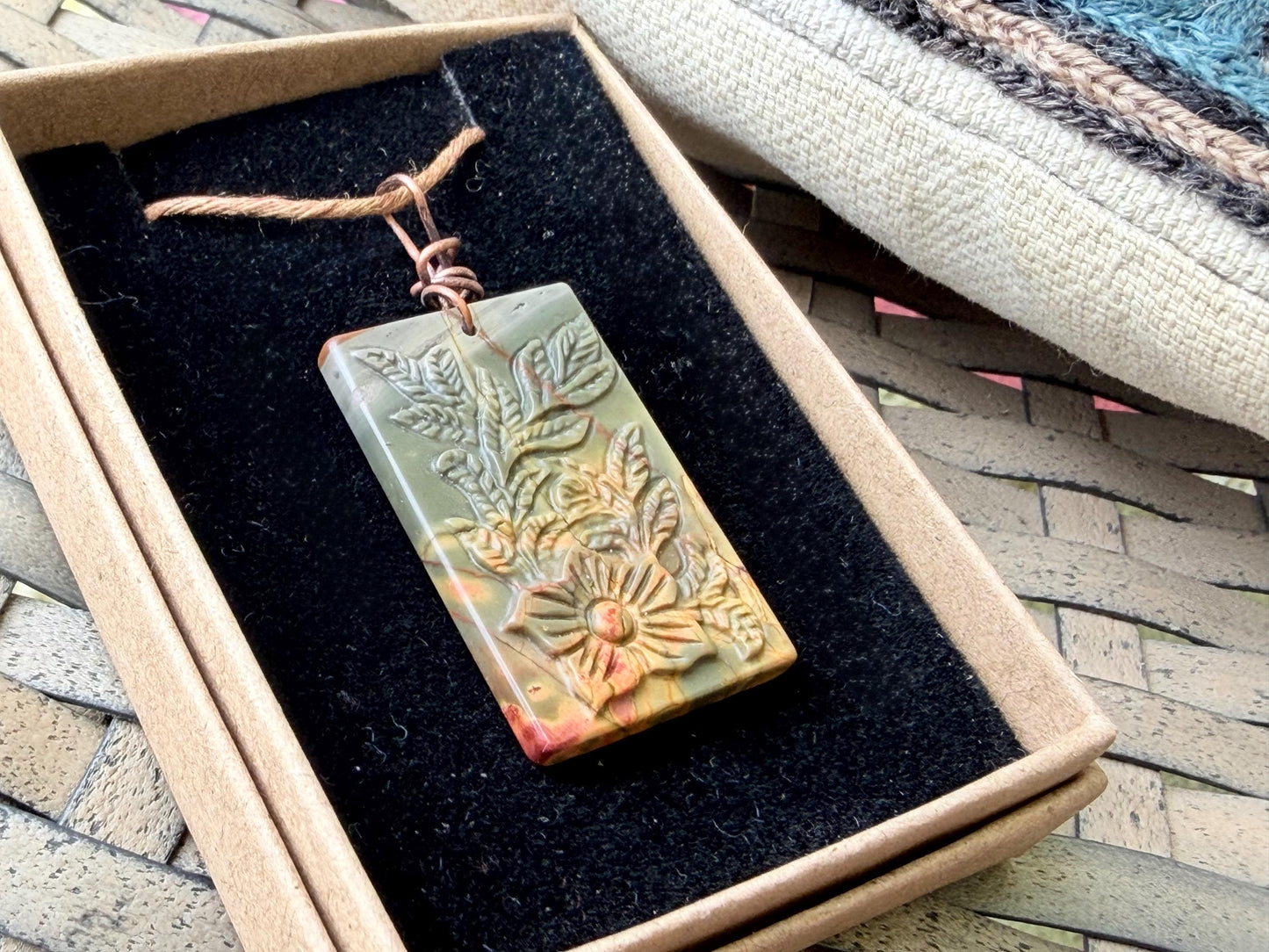 Carved Picasso Jasper gemstone necklace. Unusual gemstone jewellery. Boho eco friendly necklace with carved flowers and leaves.