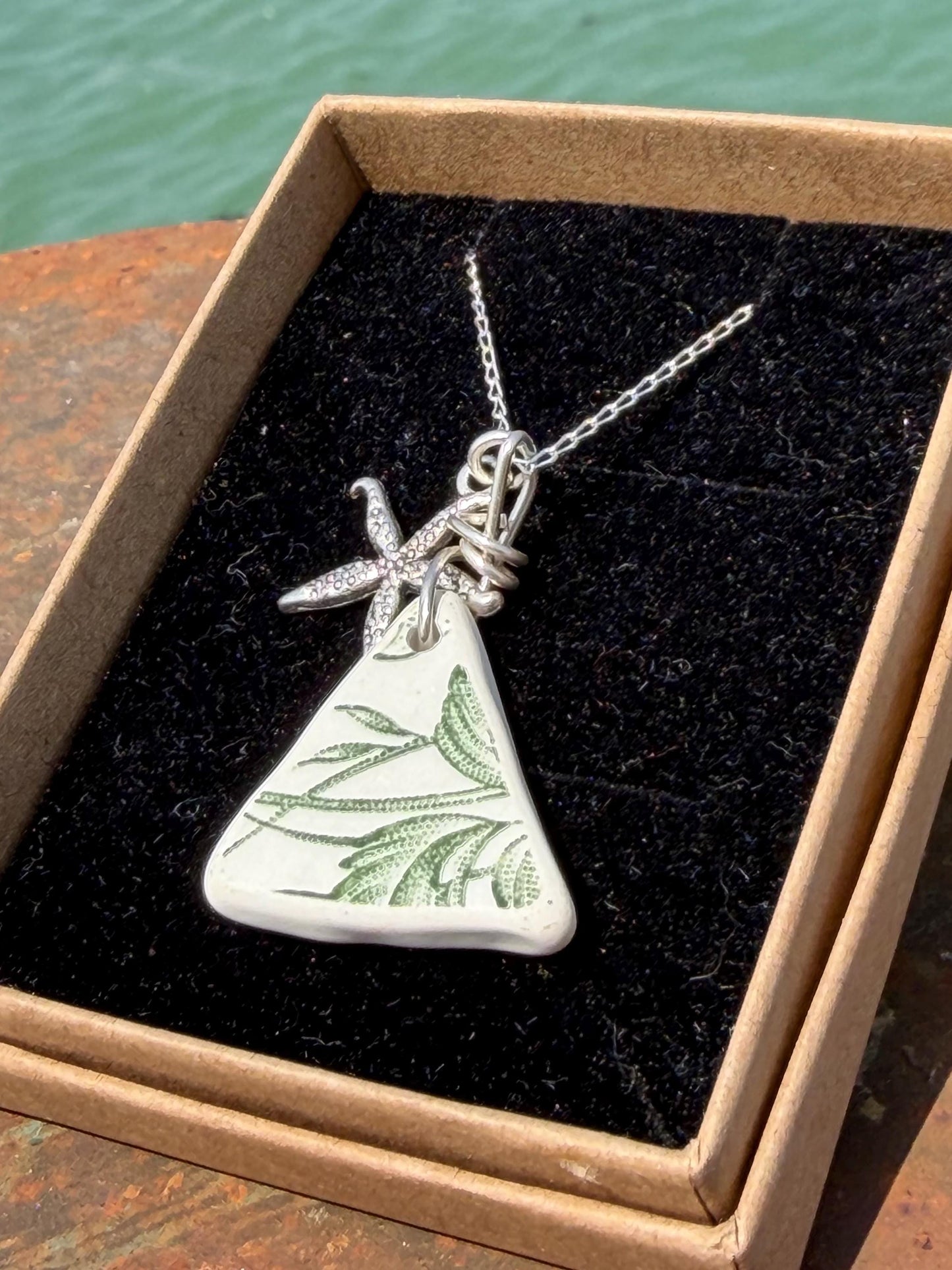 Eco friendly sea ceramic necklace on a sterling silver chain. Eco friendly jewellery, ethical jewellery. Eco friendly necklace.