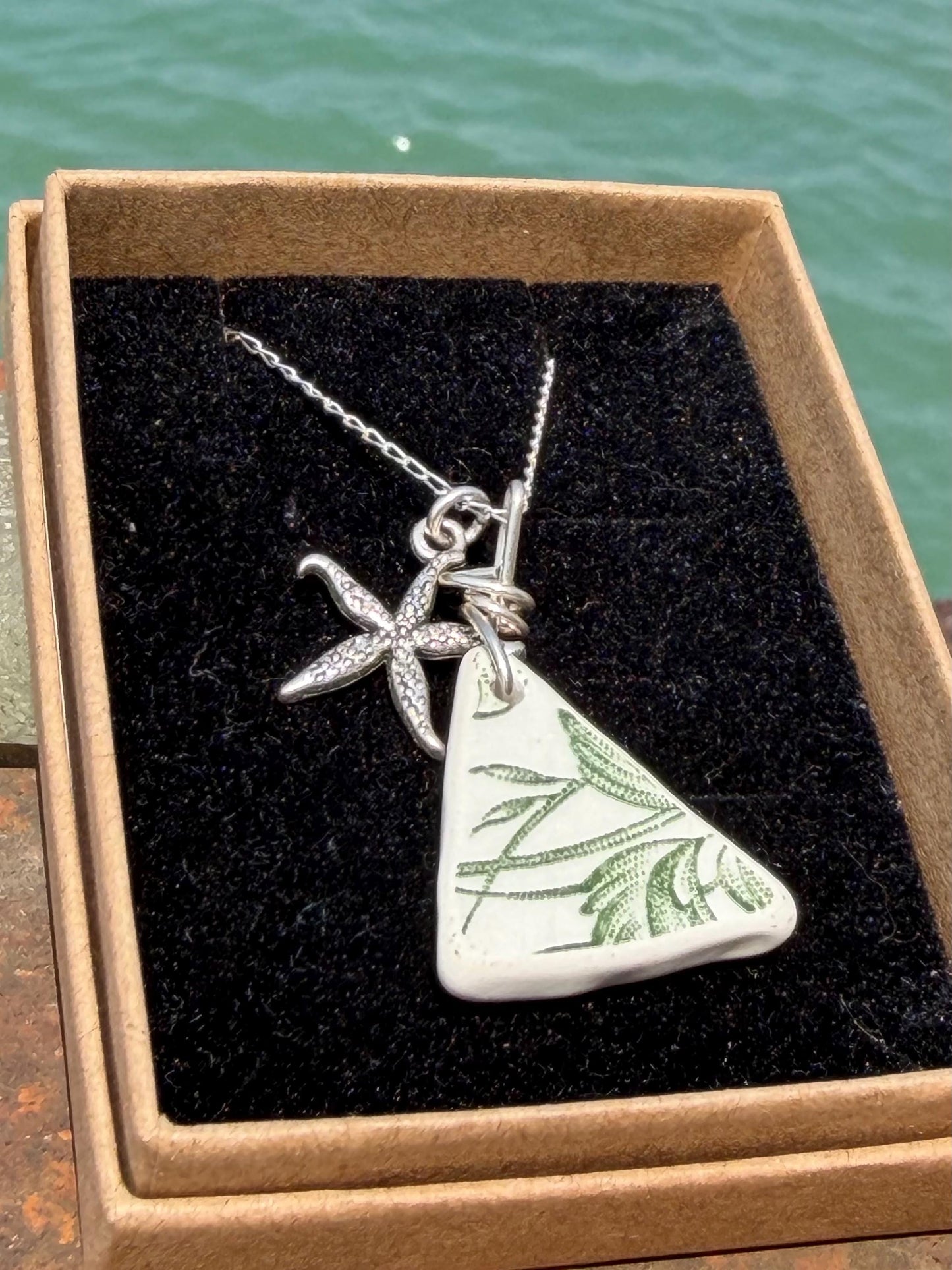Eco friendly sea ceramic necklace on a sterling silver chain. Eco friendly jewellery, ethical jewellery. Eco friendly necklace.