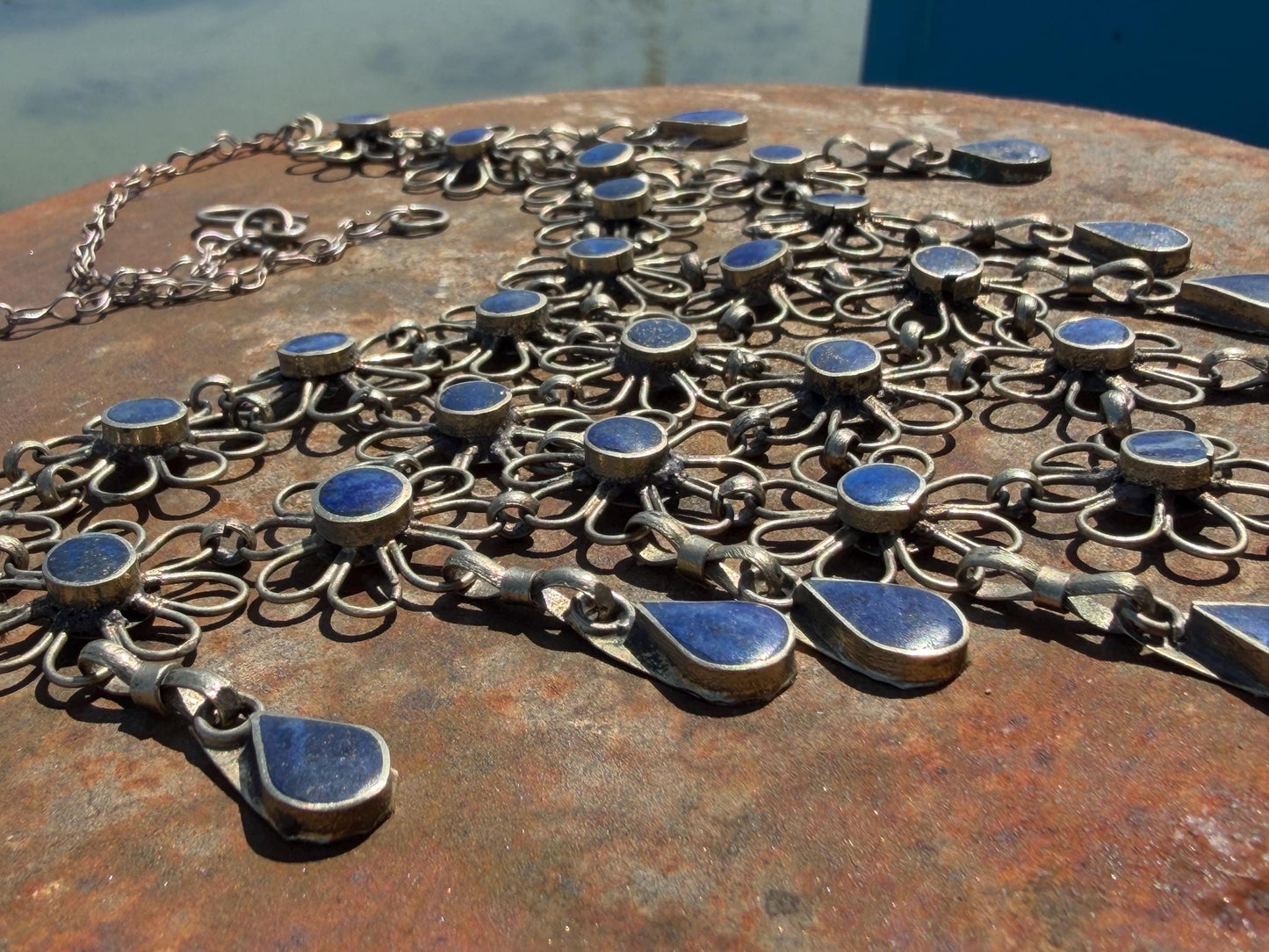 Absolutely stunning vintage waterfall necklace made with Lapis and alpaca silver. Unusual lapis necklace.