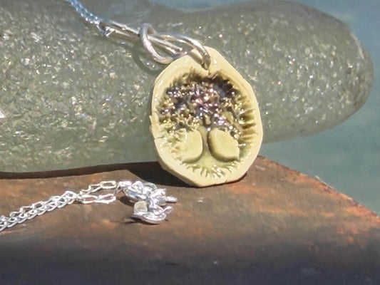 Handmade tree of life necklace. Eco friendly jewellery. Ethical pendants made with waste clay and recycled sterling silver. Eco jewellery.