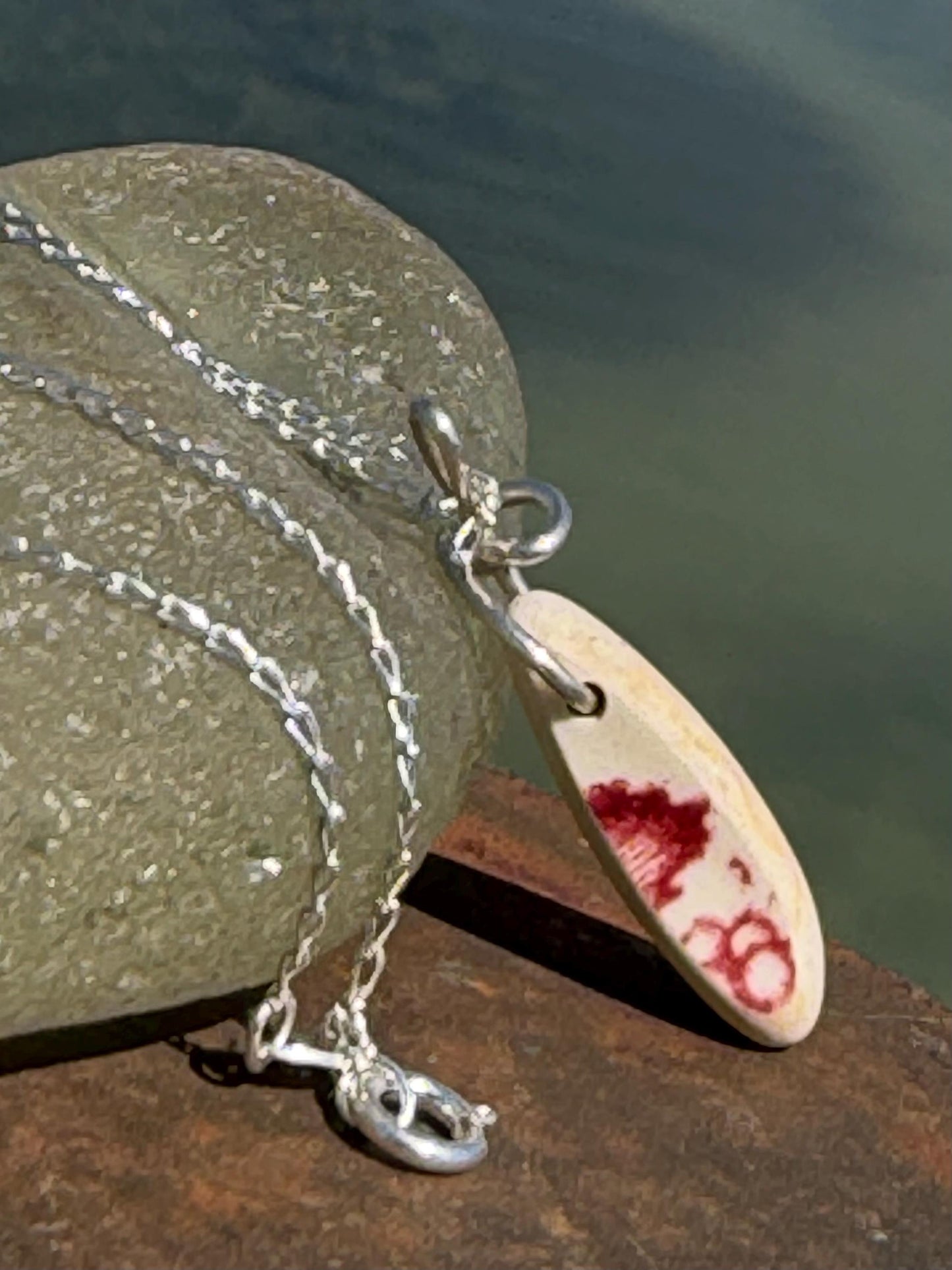 Eco friendly sea ceramic necklace on a sterling silver chain. Eco friendly jewellery, ethical jewellery. Eco friendly necklace.