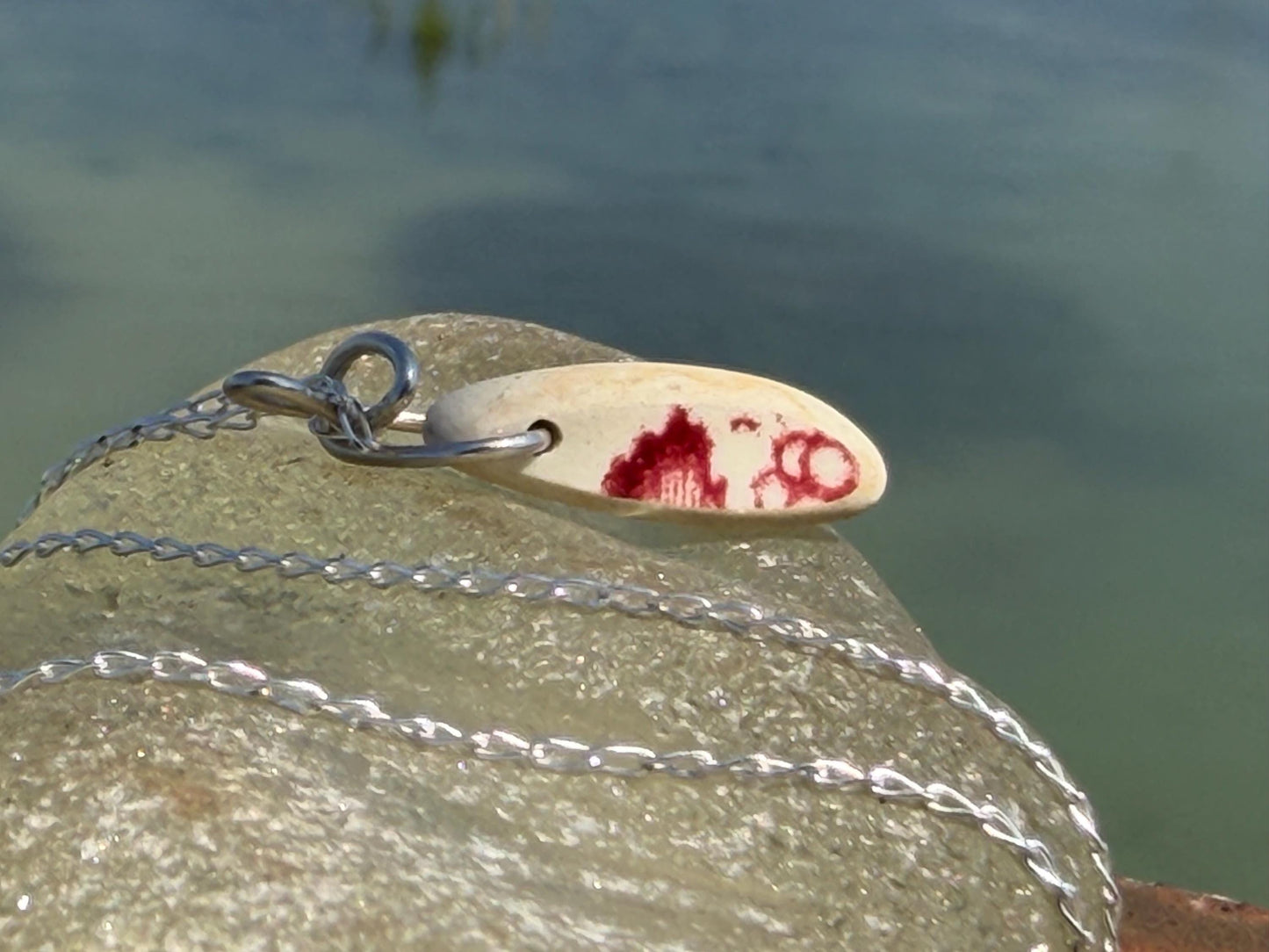 Eco friendly sea ceramic necklace on a sterling silver chain. Eco friendly jewellery, ethical jewellery. Eco friendly necklace.