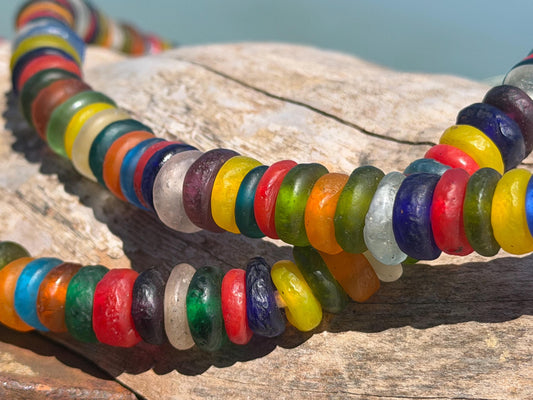Eco friendly necklace made from recycled glass and hung in raffia. Ethical jewellery that doesnt cost the earth! Sustainable, eco gifts