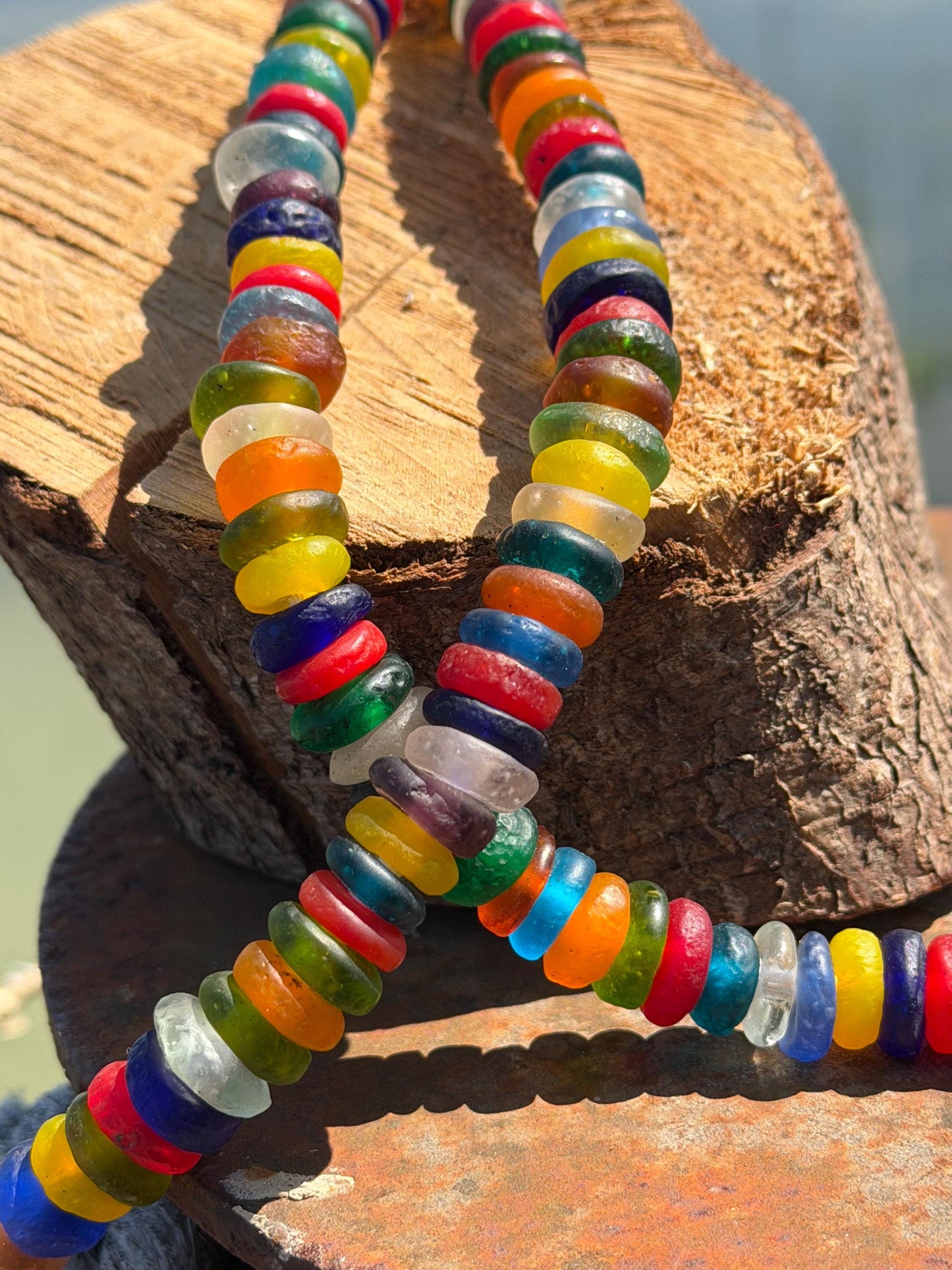 Eco friendly necklace made from recycled glass and hung in raffia. Ethical jewellery that doesnt cost the earth! Sustainable, eco gifts