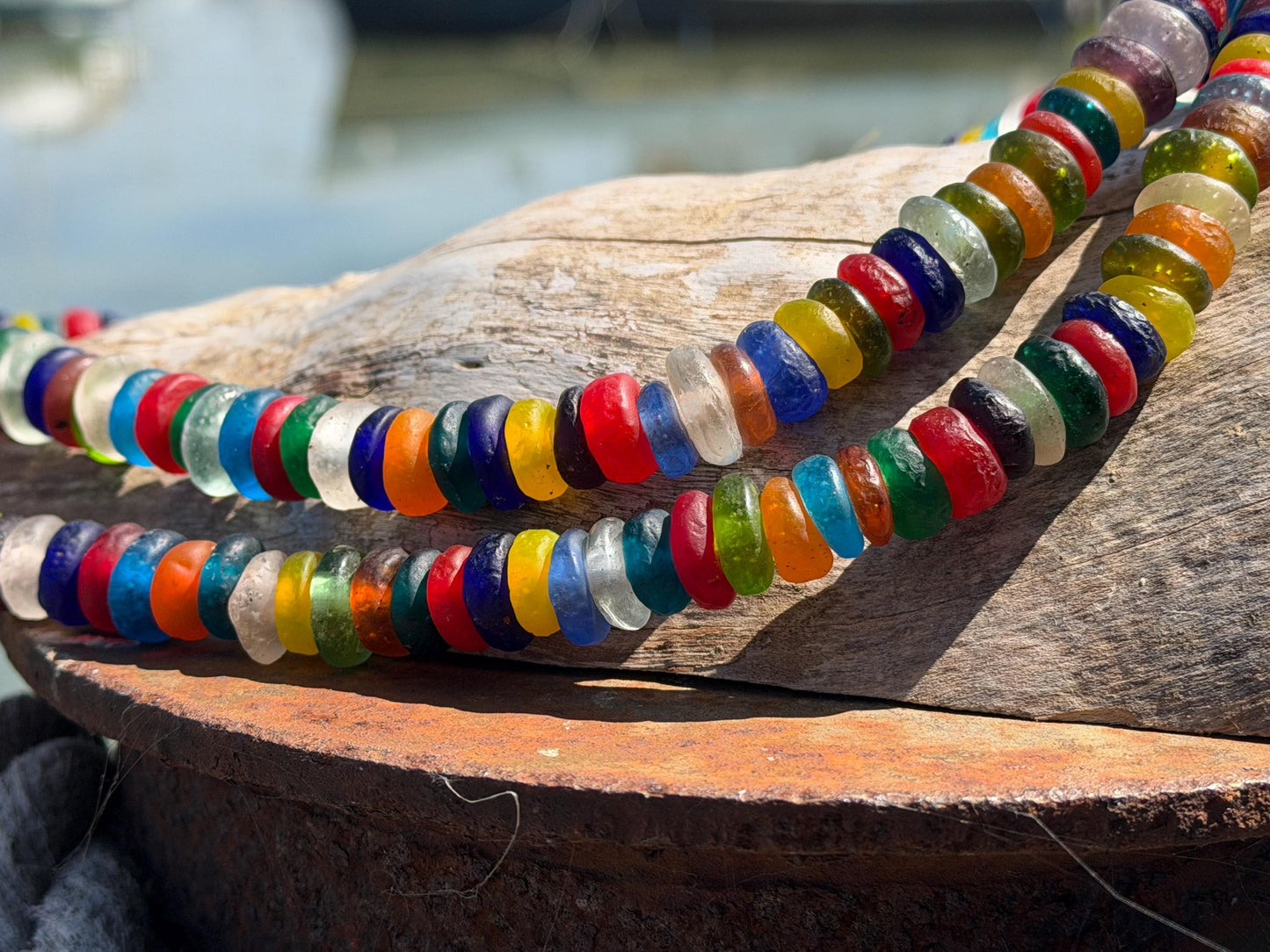 Eco friendly necklace made from recycled glass and hung in raffia. Ethical jewellery that doesnt cost the earth! Sustainable, eco gifts
