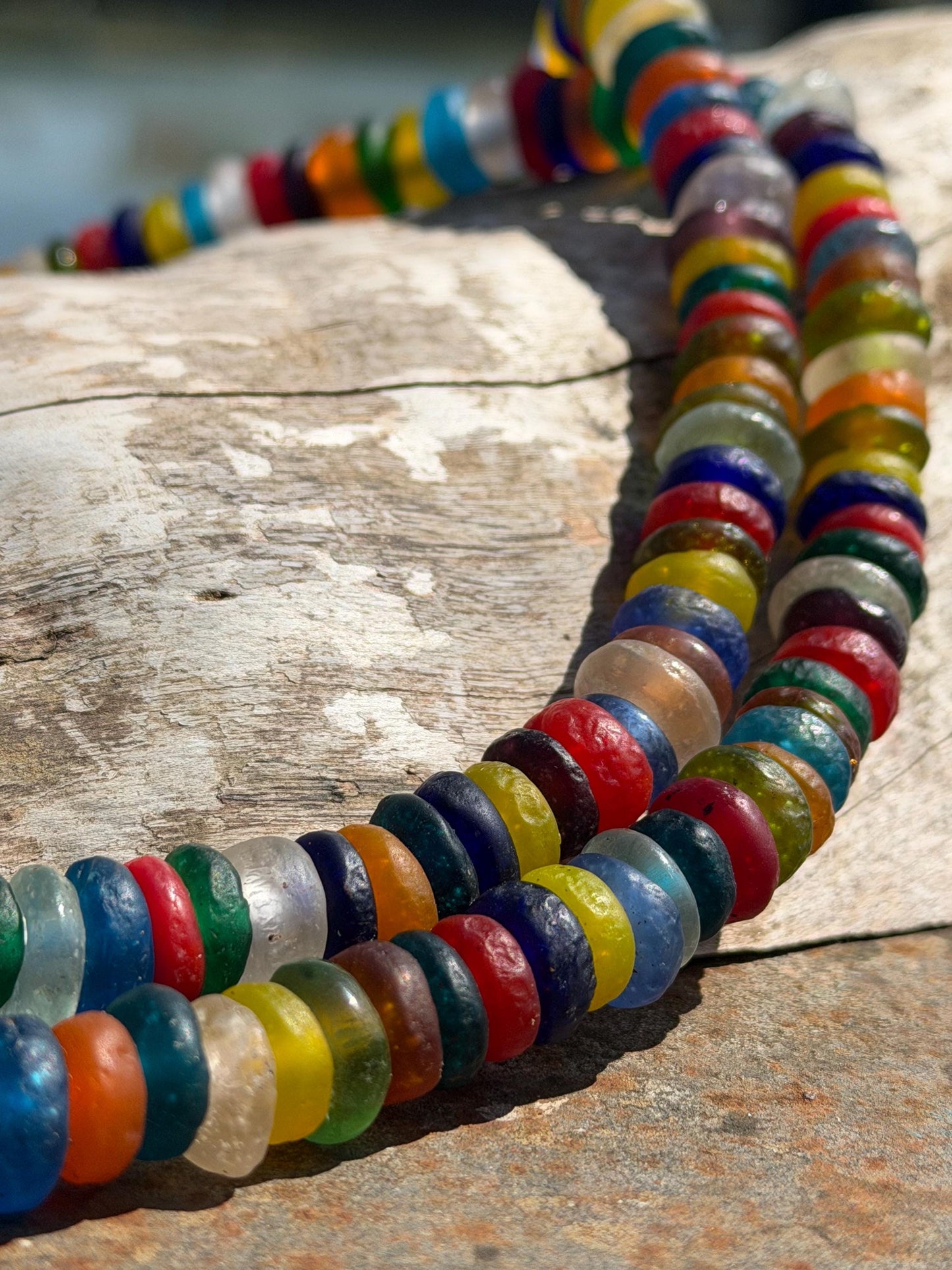 Eco friendly necklace made from recycled glass and hung in raffia. Ethical jewellery that doesnt cost the earth! Sustainable, eco gifts