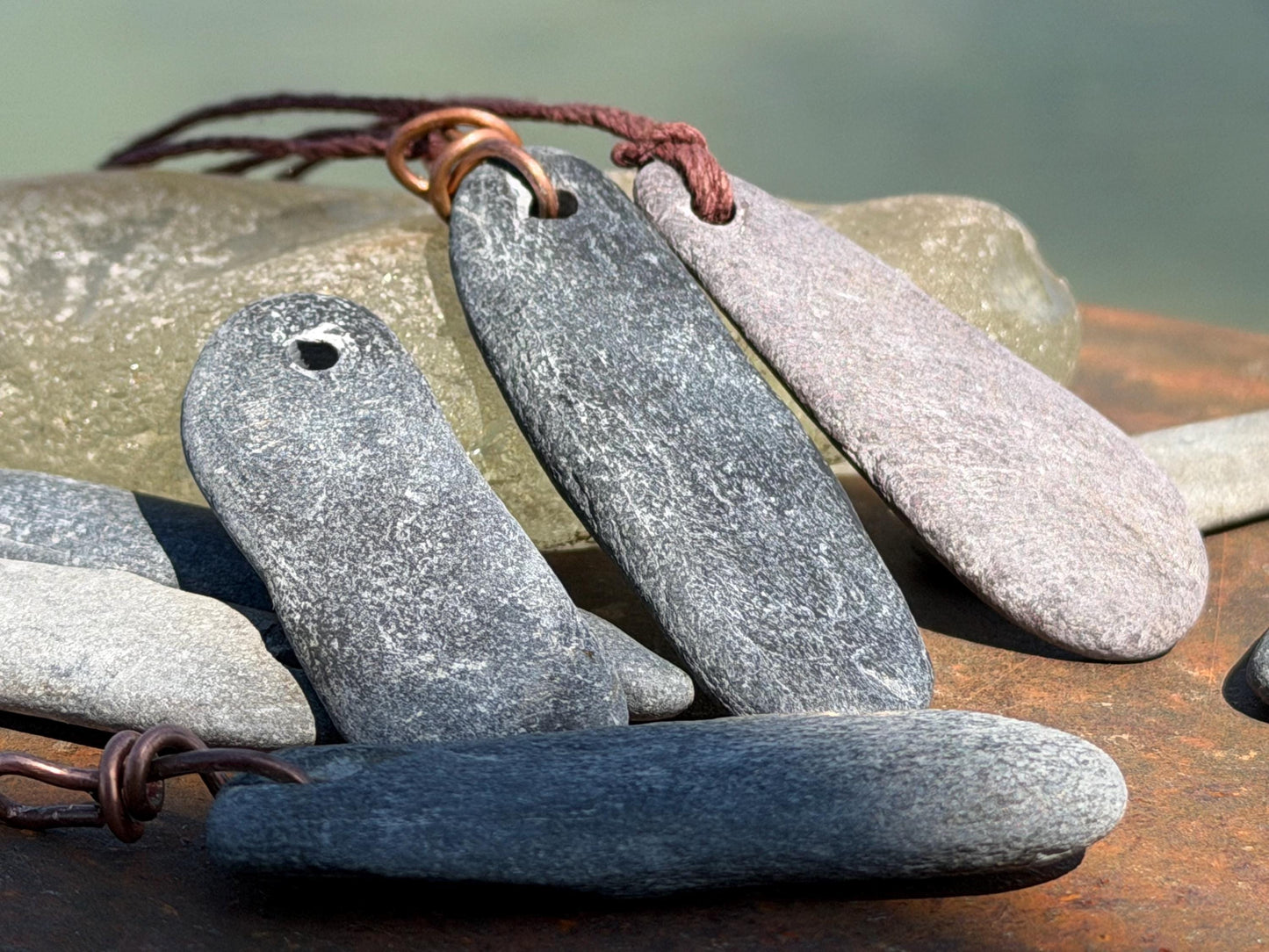 Eco friendly Cornish slate pendants. Earthy, eco and sustainable gift for him. Handmade frey slate necklaces. Handcrafted gifts for men.