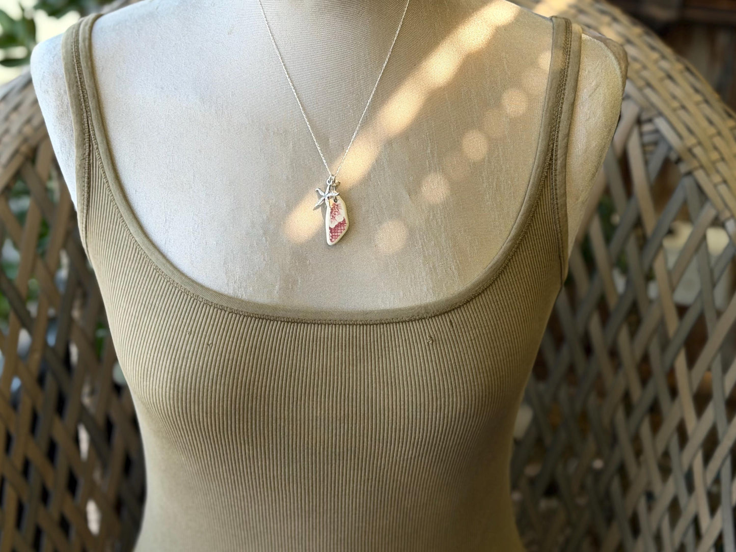Eco friendly sea ceramic necklace on a sterling silver chain. Eco friendly jewellery, ethical jewellery. Eco friendly necklace.