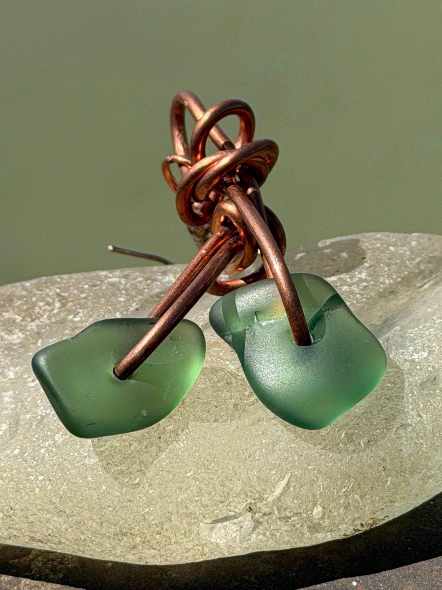 Handmade green sea glass on recycled copper. Unique earrings, ethical jewellery, unusual jewellery, eco friendly jewellery. Quirky jewellery