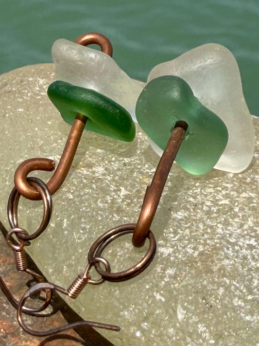 Handmade green & white sea glass on recycled copper. Unique earrings, ethical jewellery, unusual jewellery, eco friendly jewellery.
