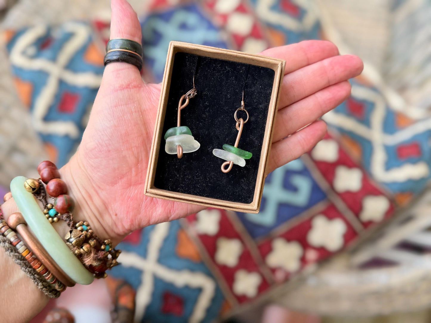 Handmade green & white sea glass on recycled copper. Unique earrings, ethical jewellery, unusual jewellery, eco friendly jewellery.