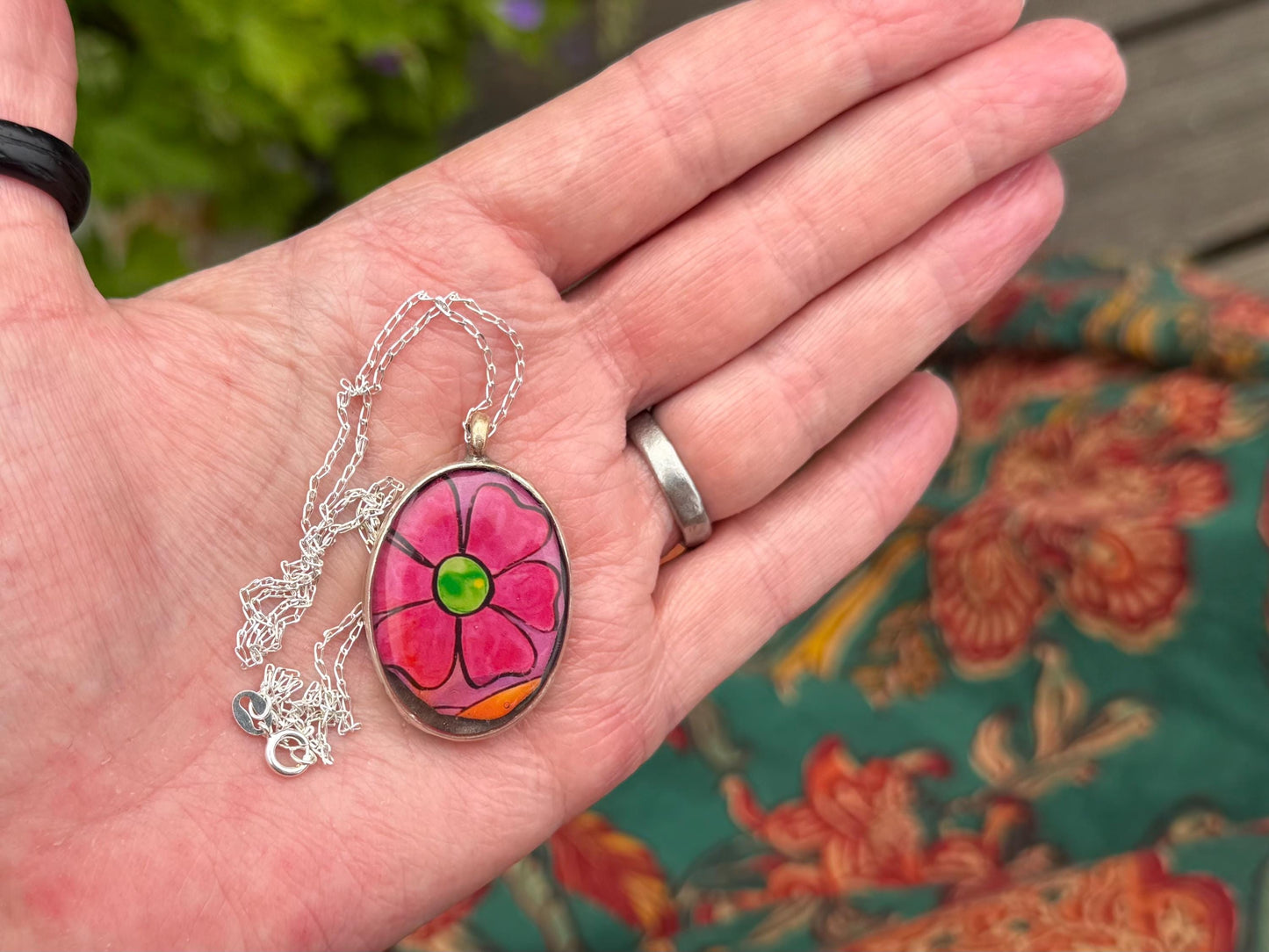 Bright joyful necklaces made with my own photos & recycled sterling silver. Eco friendly jewellery. Boho colourful pendants. Bright pink.