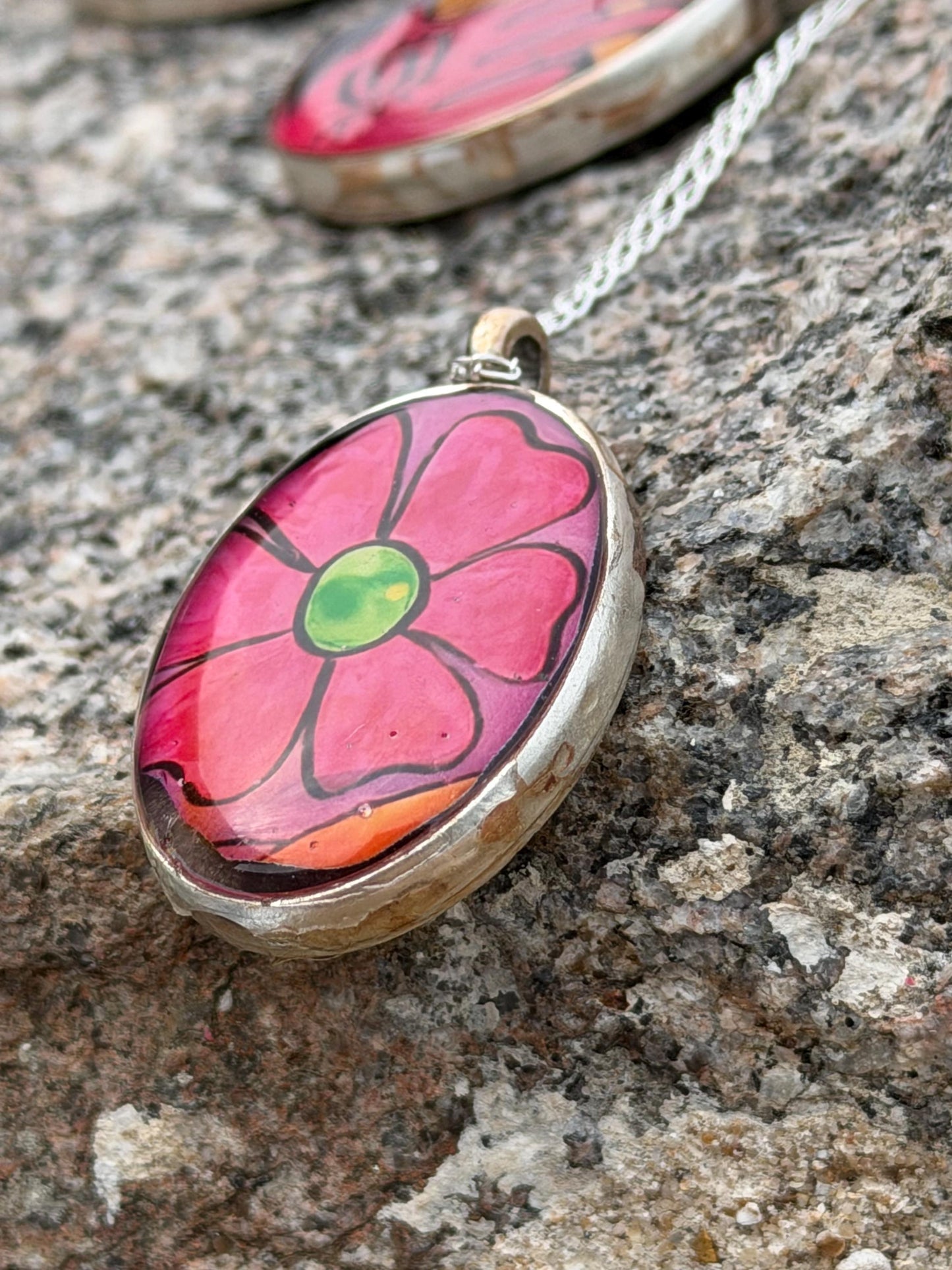 Bright joyful necklaces made with my own photos & recycled sterling silver. Eco friendly jewellery. Boho colourful pendants. Bright pink.