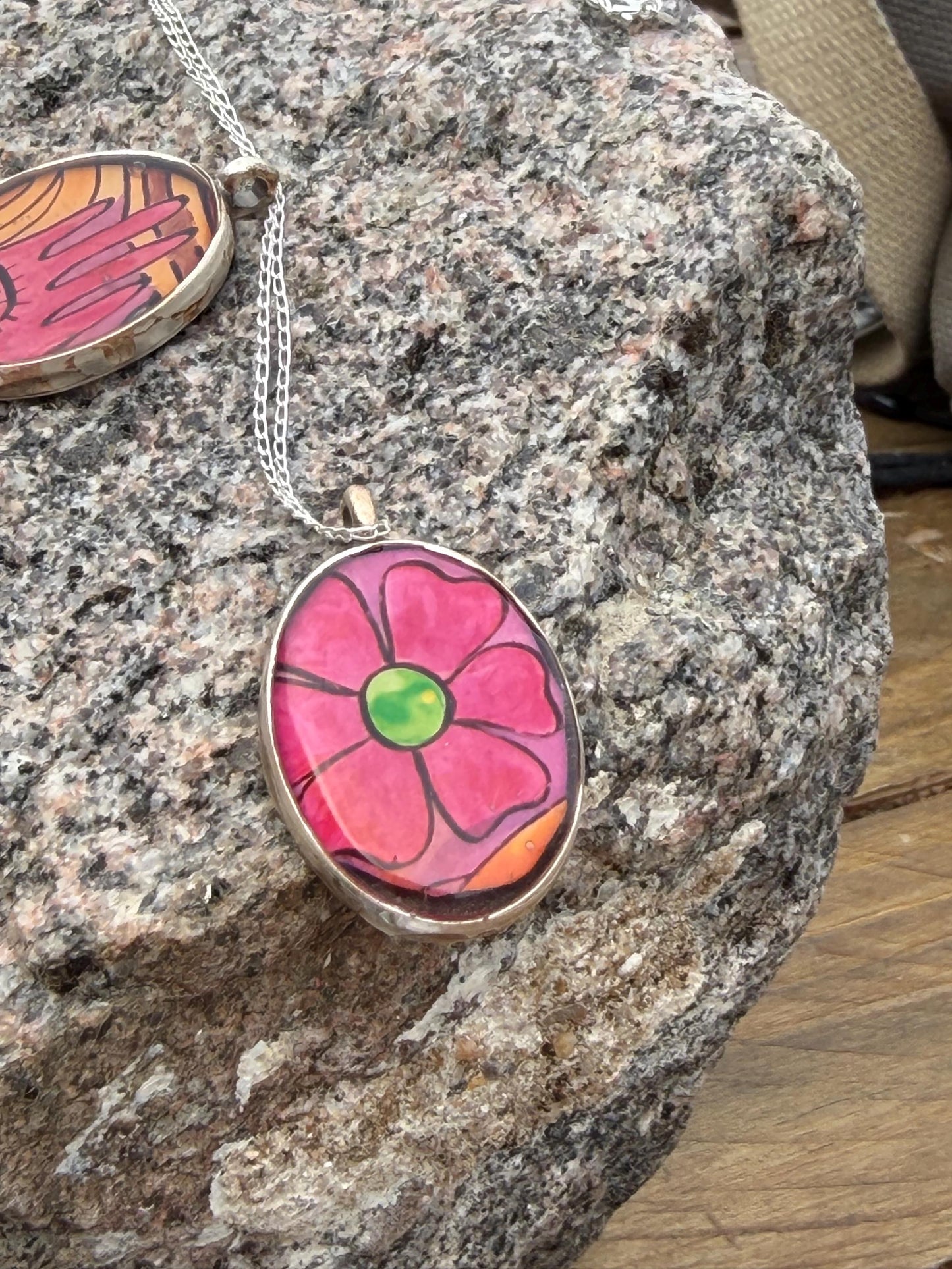 Bright joyful necklaces made with my own photos & recycled sterling silver. Eco friendly jewellery. Boho colourful pendants. Bright pink.